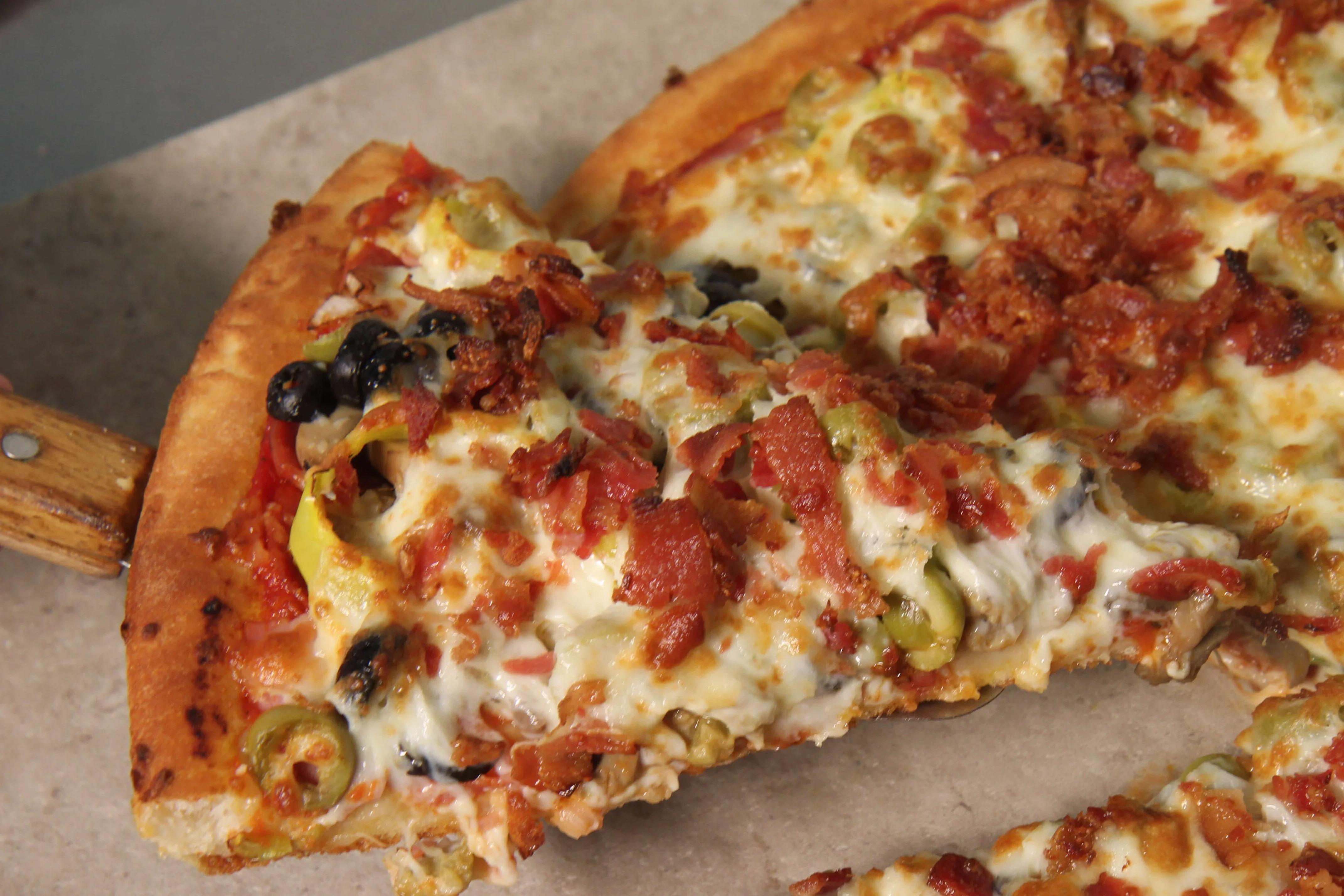 Loaded meat lover's pizza with cheese and toppings