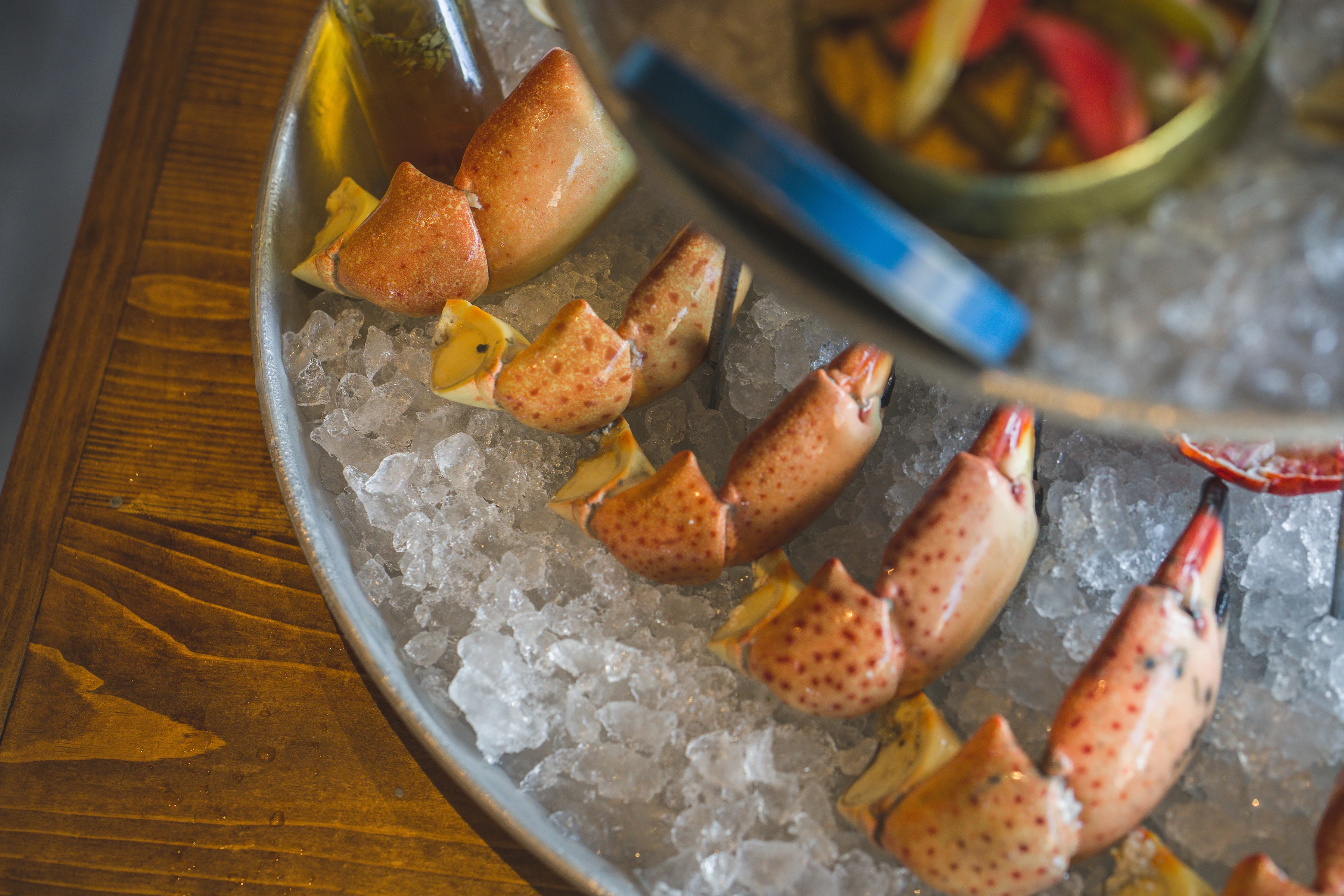 Chilled lobster claws on ice platter