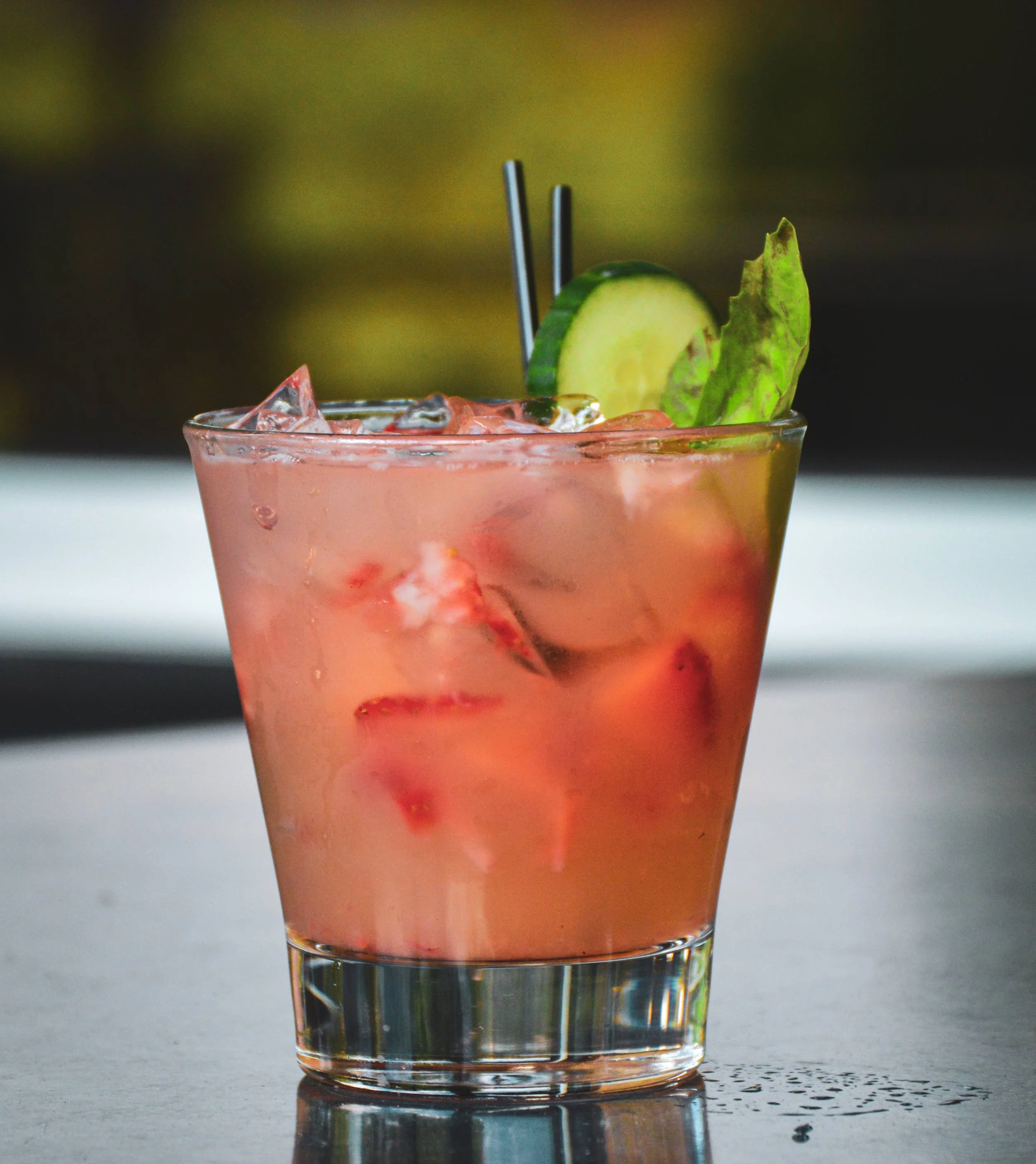Weekend Vibes cocktail on a table on the patio