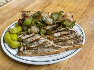 Grilled Italian panini with sautéed vegetables