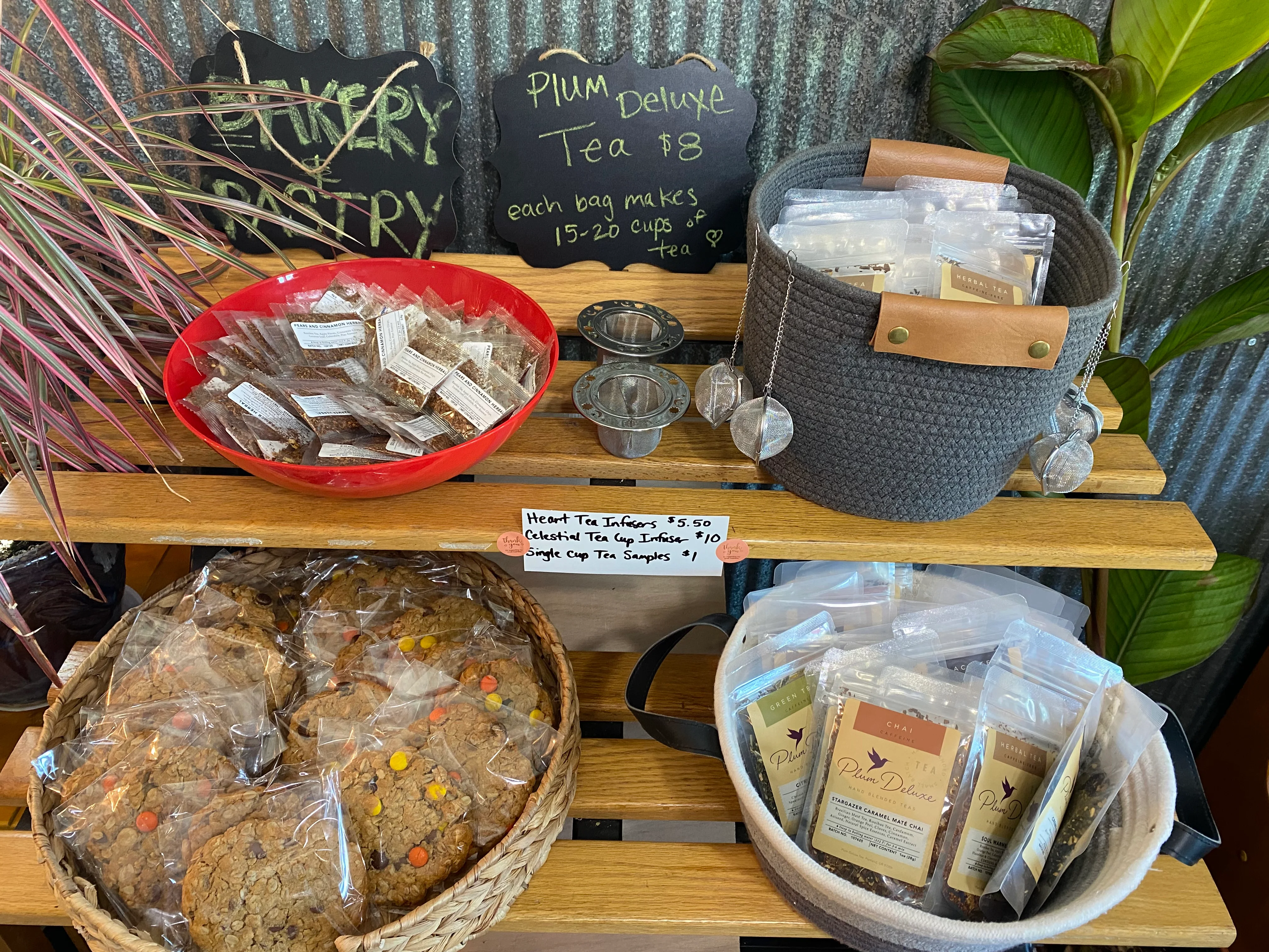 Selection of herbal teas and cookies in a cozy café setting