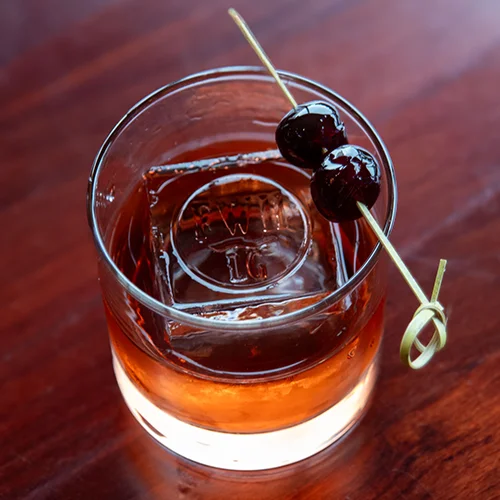 drink with a FWH Stamp on the ice cube