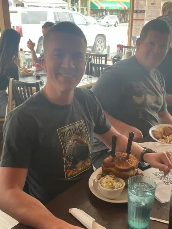 Casual dining scene with burgers and sweet potato fries