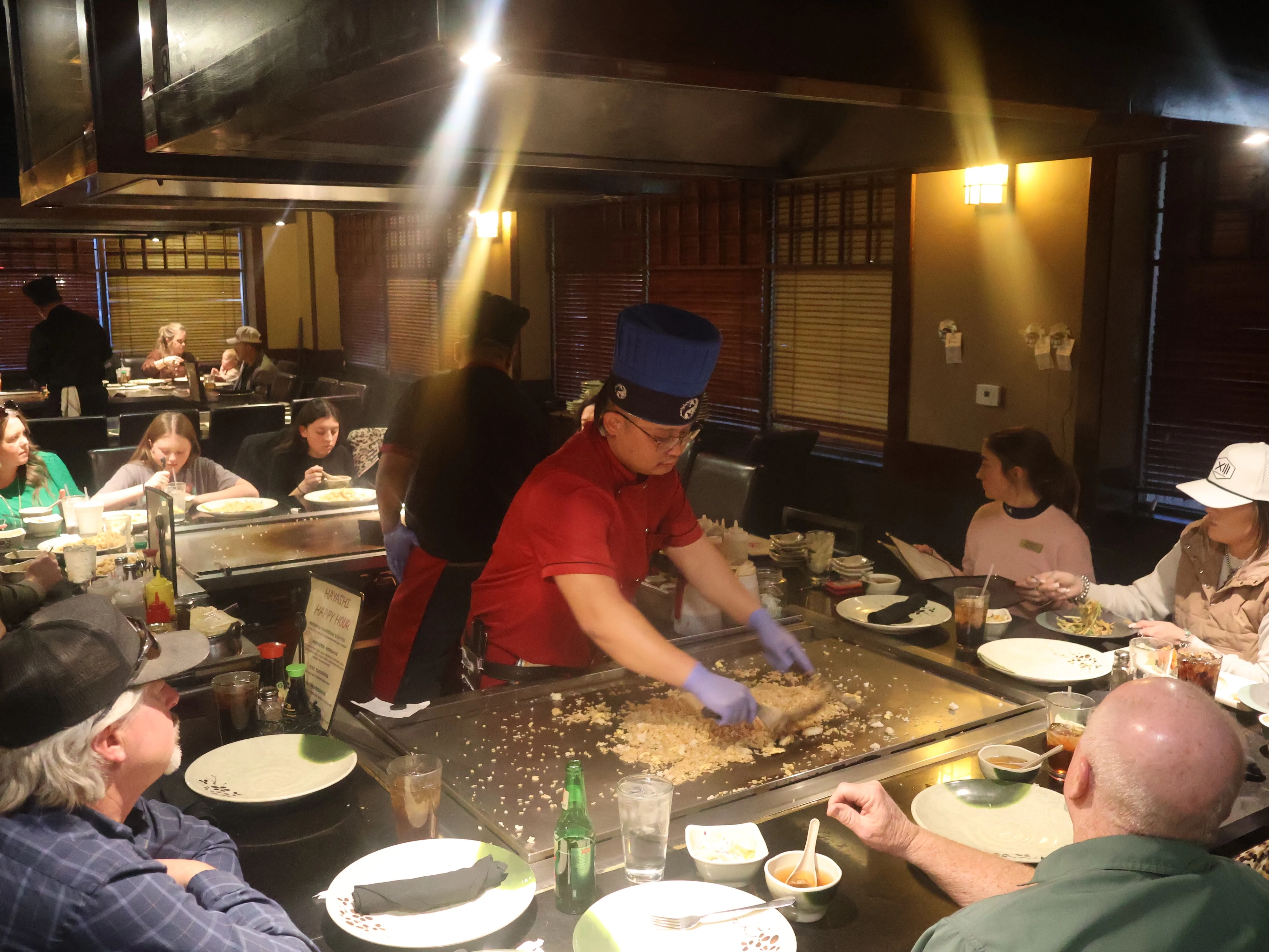 Teppanyaki chef preparing rice at a Japanese restaurant