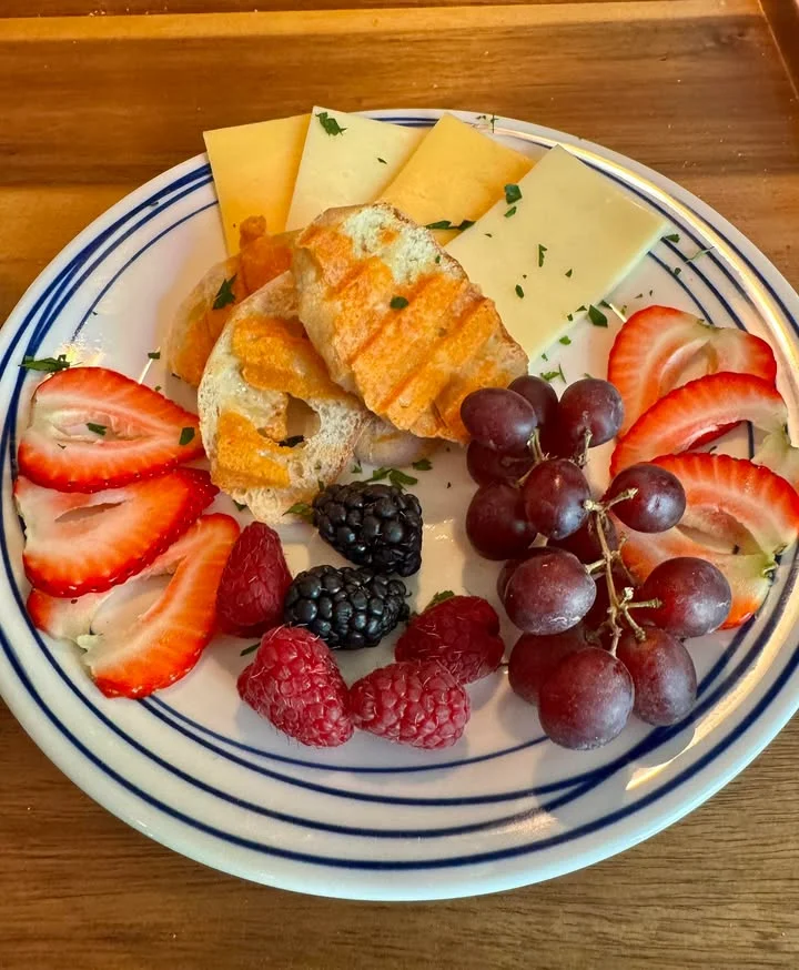 Artisan cheese platter with fresh fruits