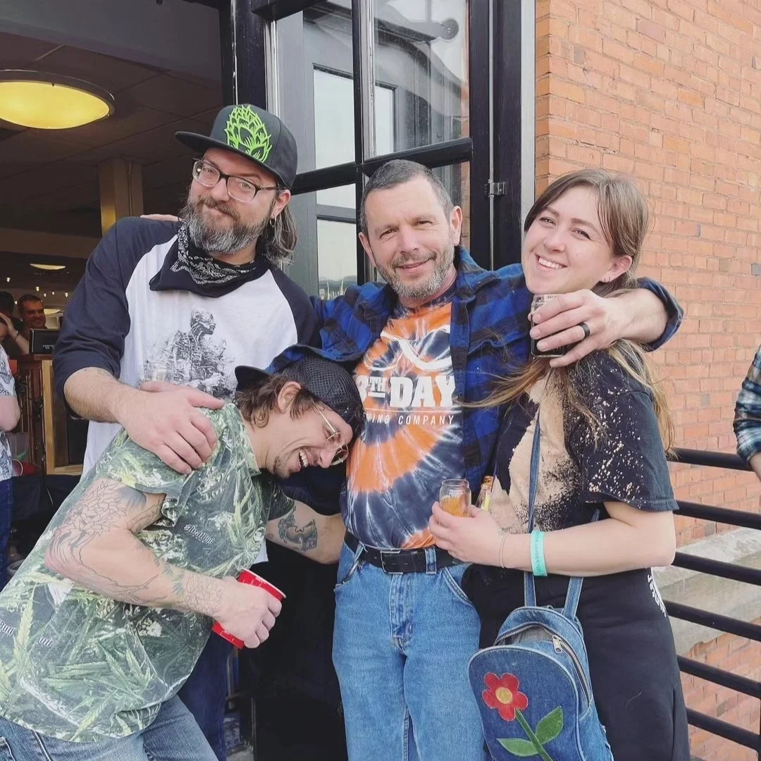 Group of friends enjoying drinks at a lively gathering