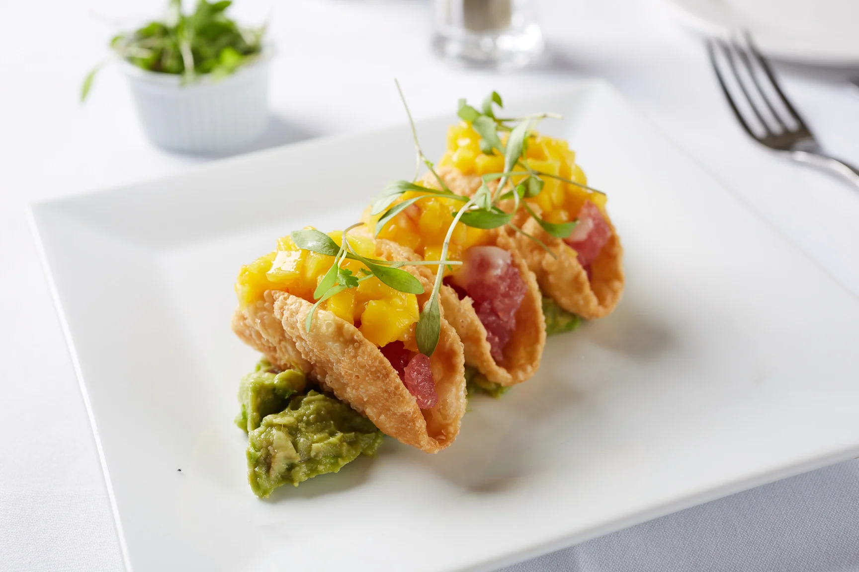 Crispy tuna tacos with mango salsa