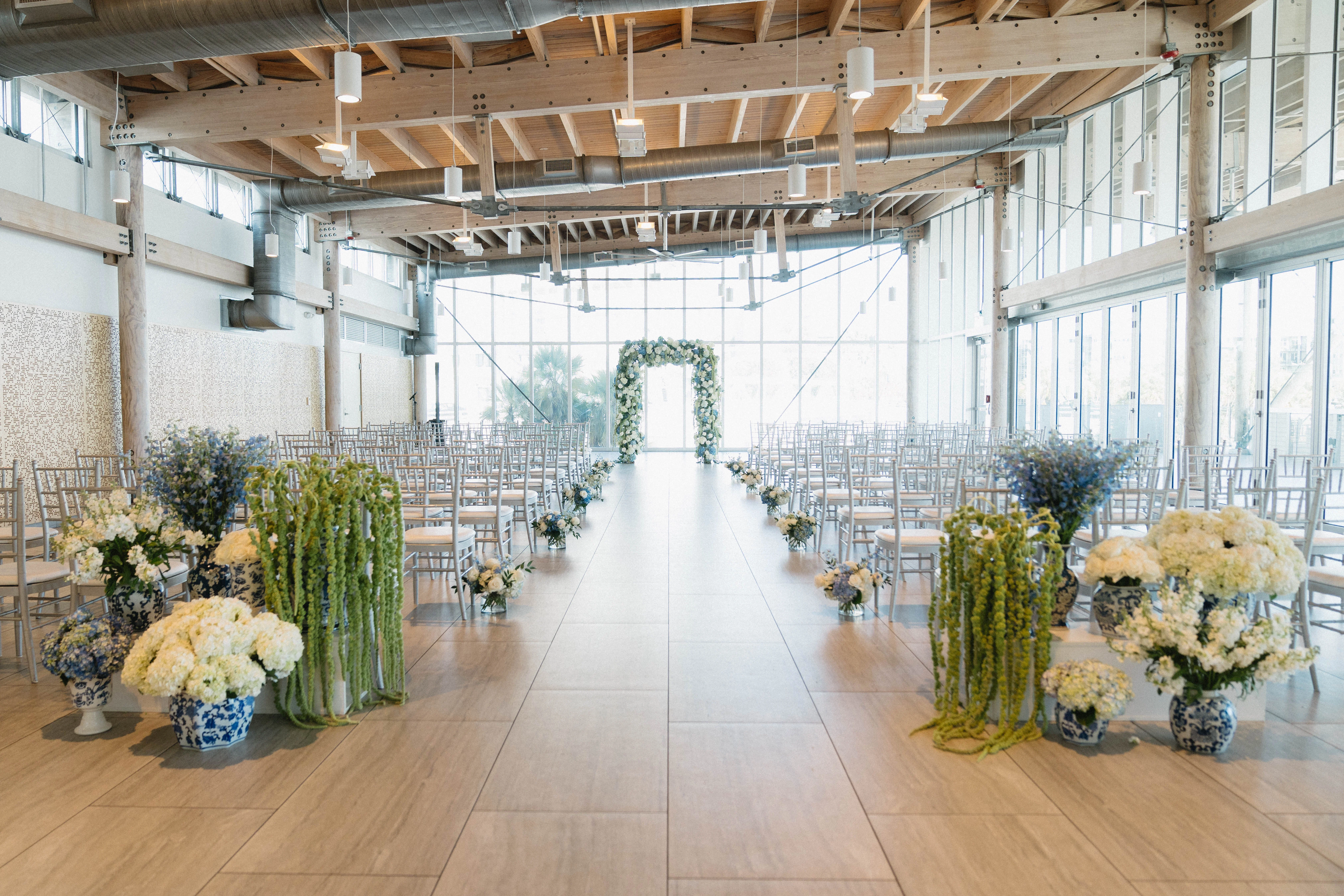 Elegant wedding ceremony setup with floral decorations and seating