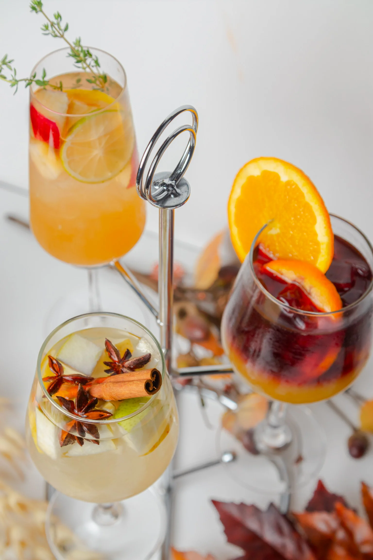 Assorted seasonal cocktails with fruits and spices