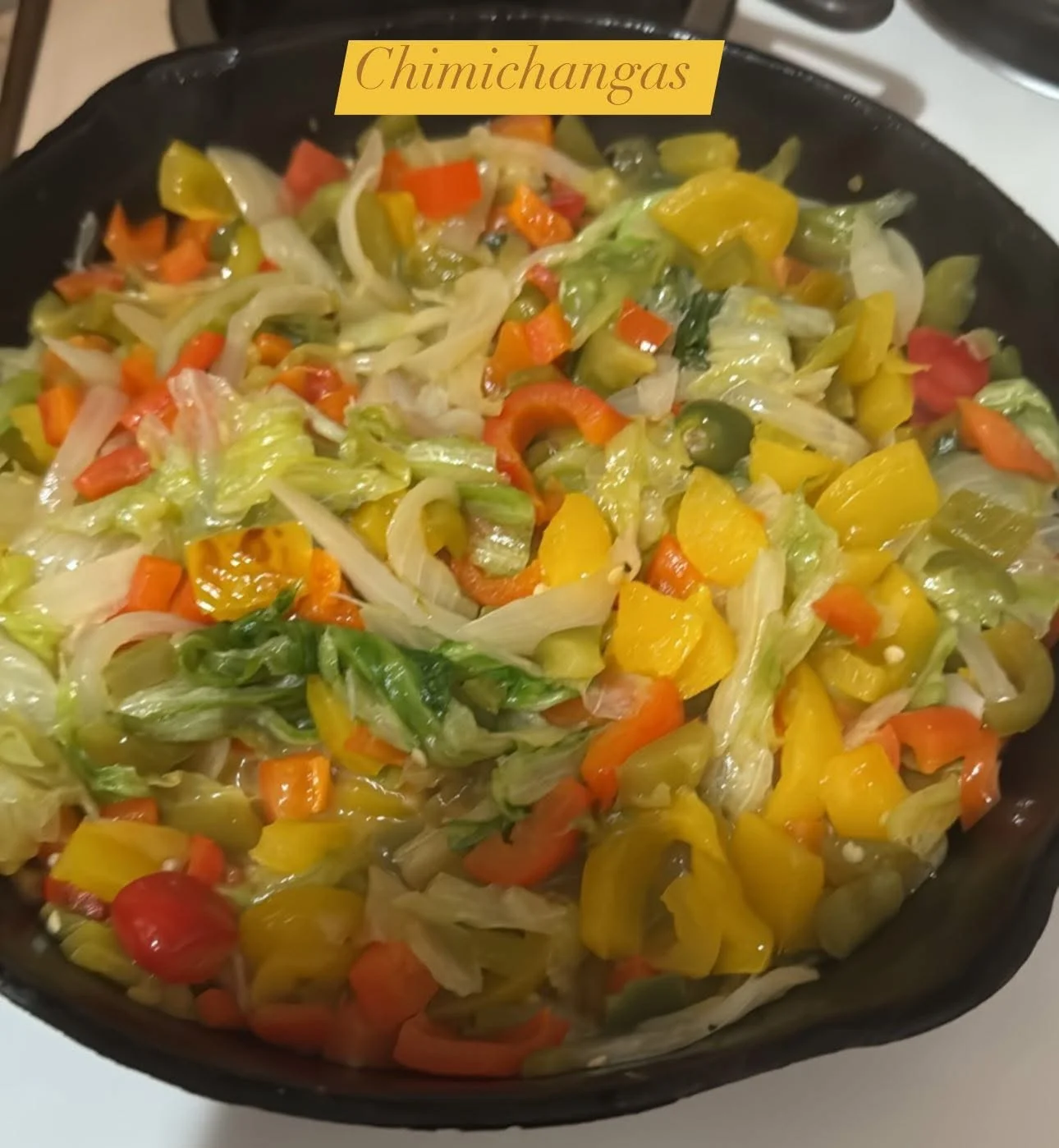 Colorful vegetable chimichangas in a skillet