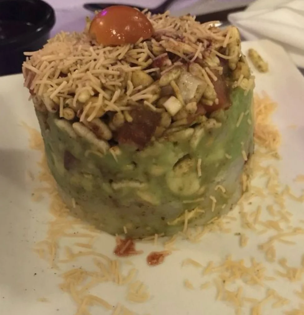 Delicious gourmet burger with fresh toppings on a wooden table