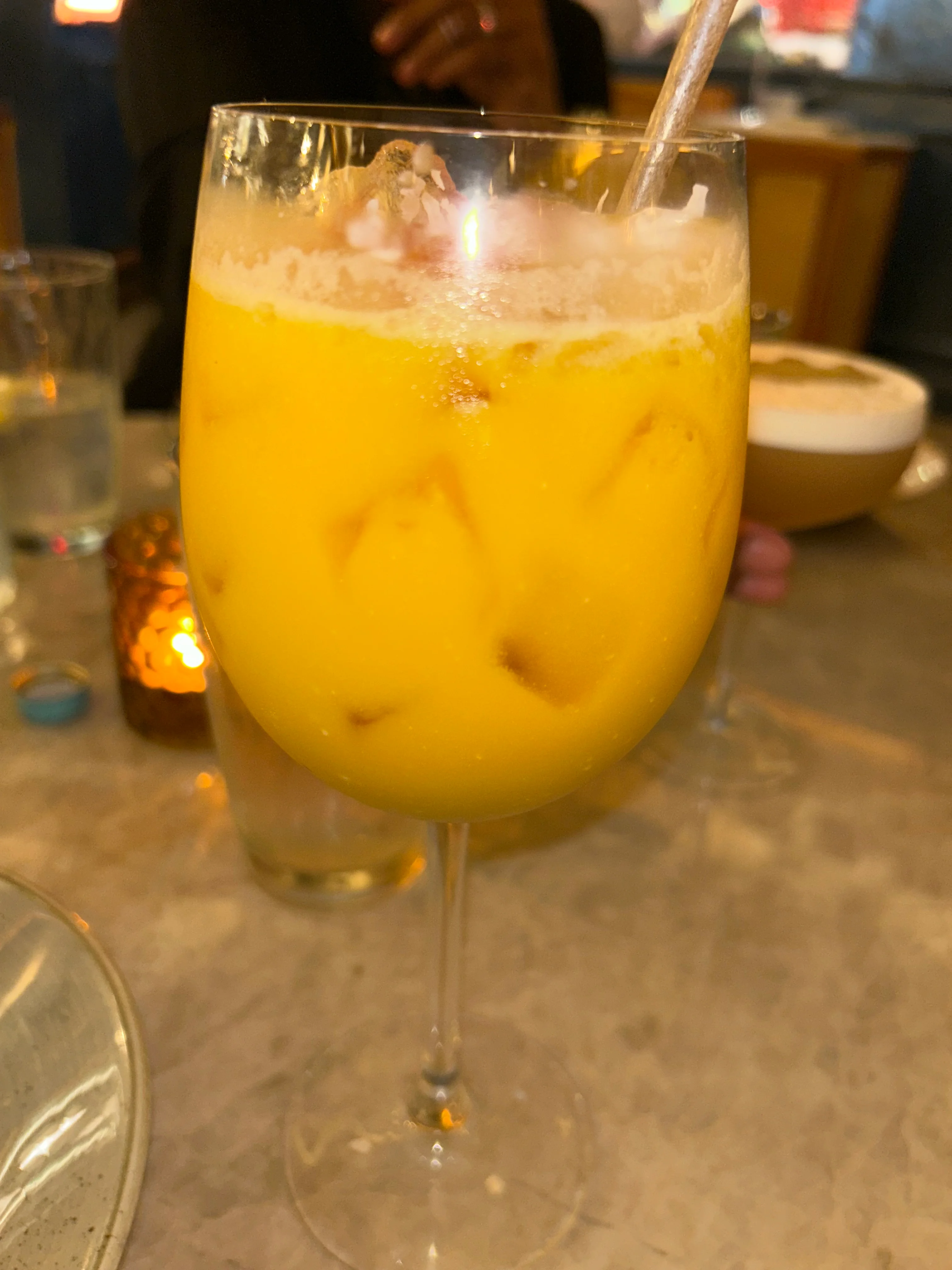 Refreshing mango cocktail in a stylish glass