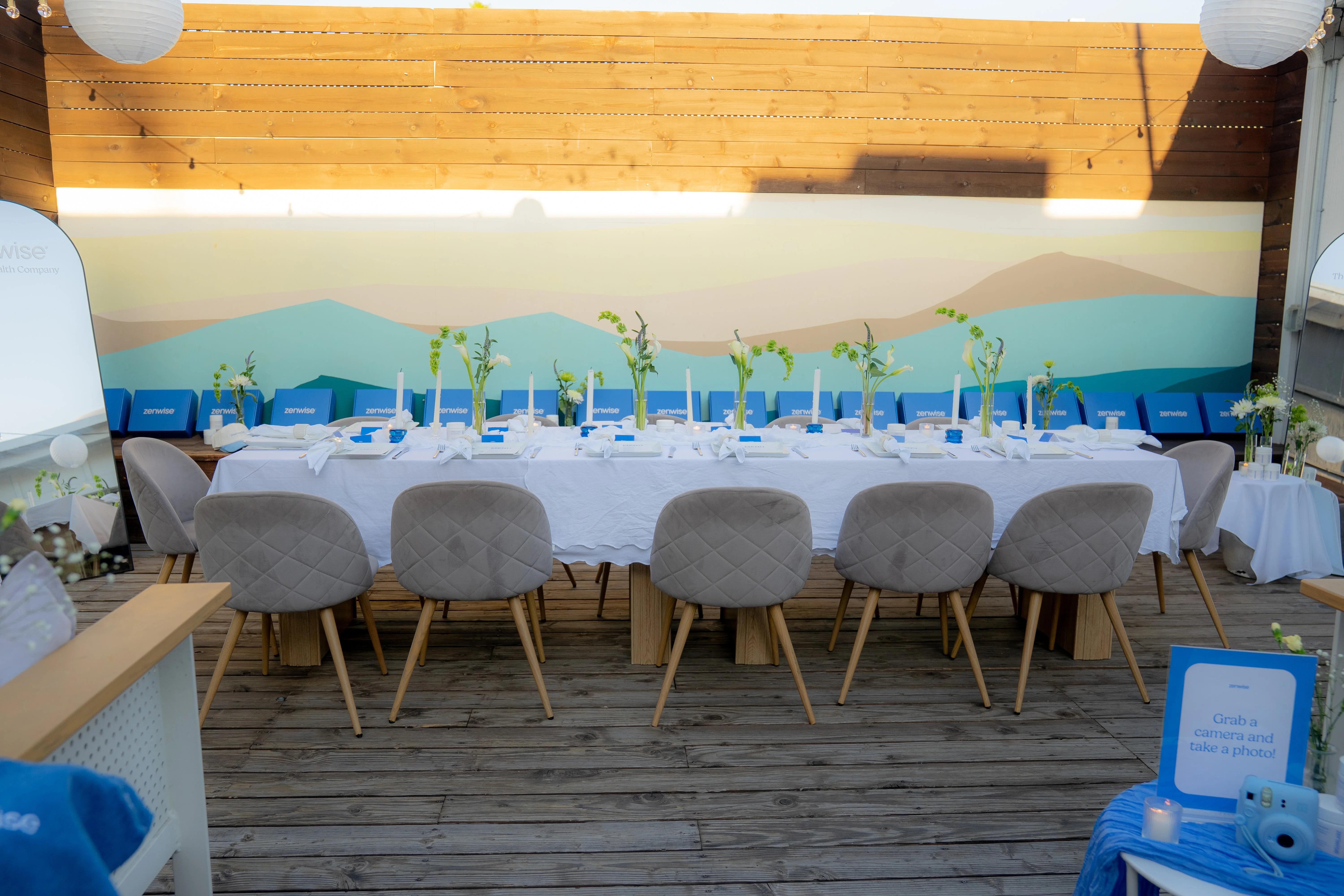 Elegant outdoor dining setup with floral centerpieces