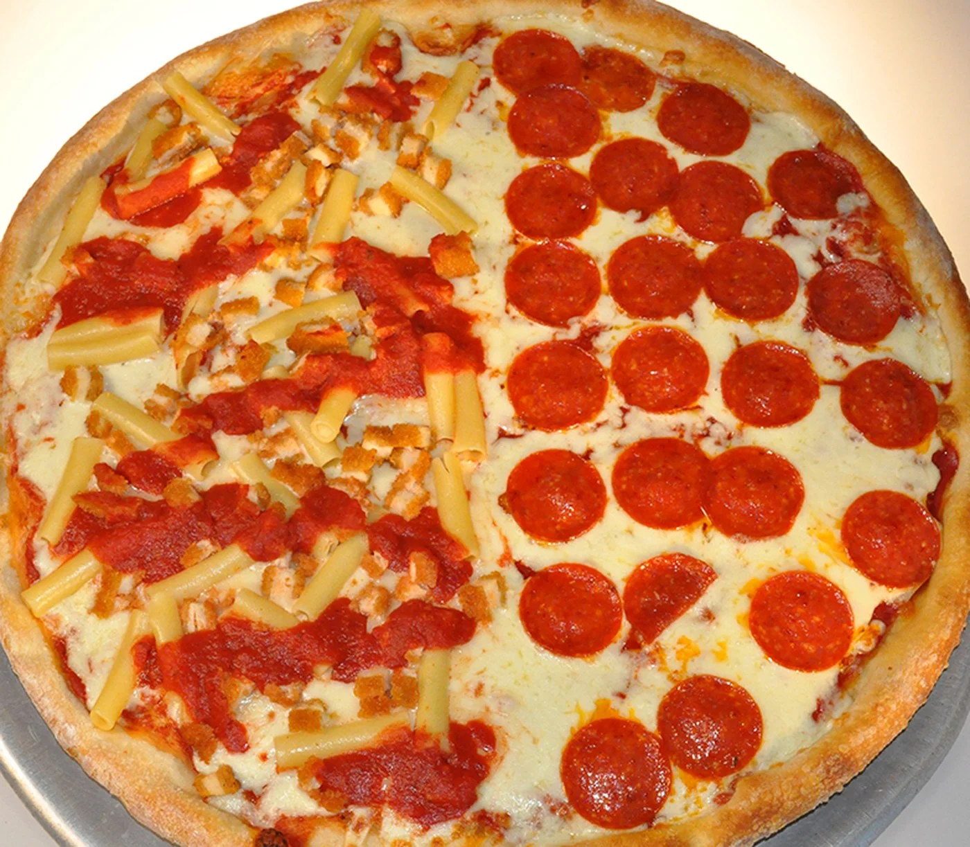 Half pepperoni, half baked ziti pie from Patio Italian Kitchen