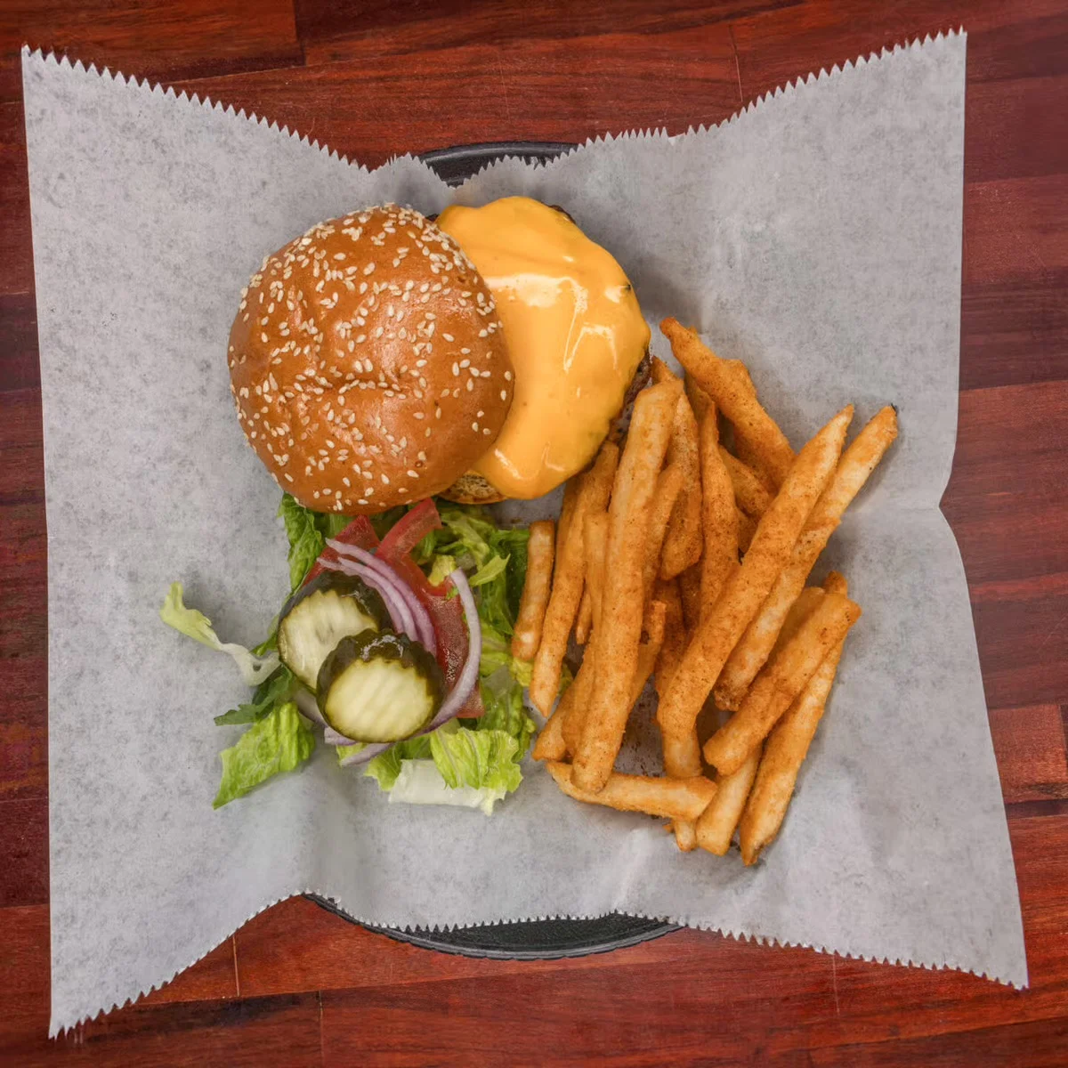 Classic American cheeseburger with fries