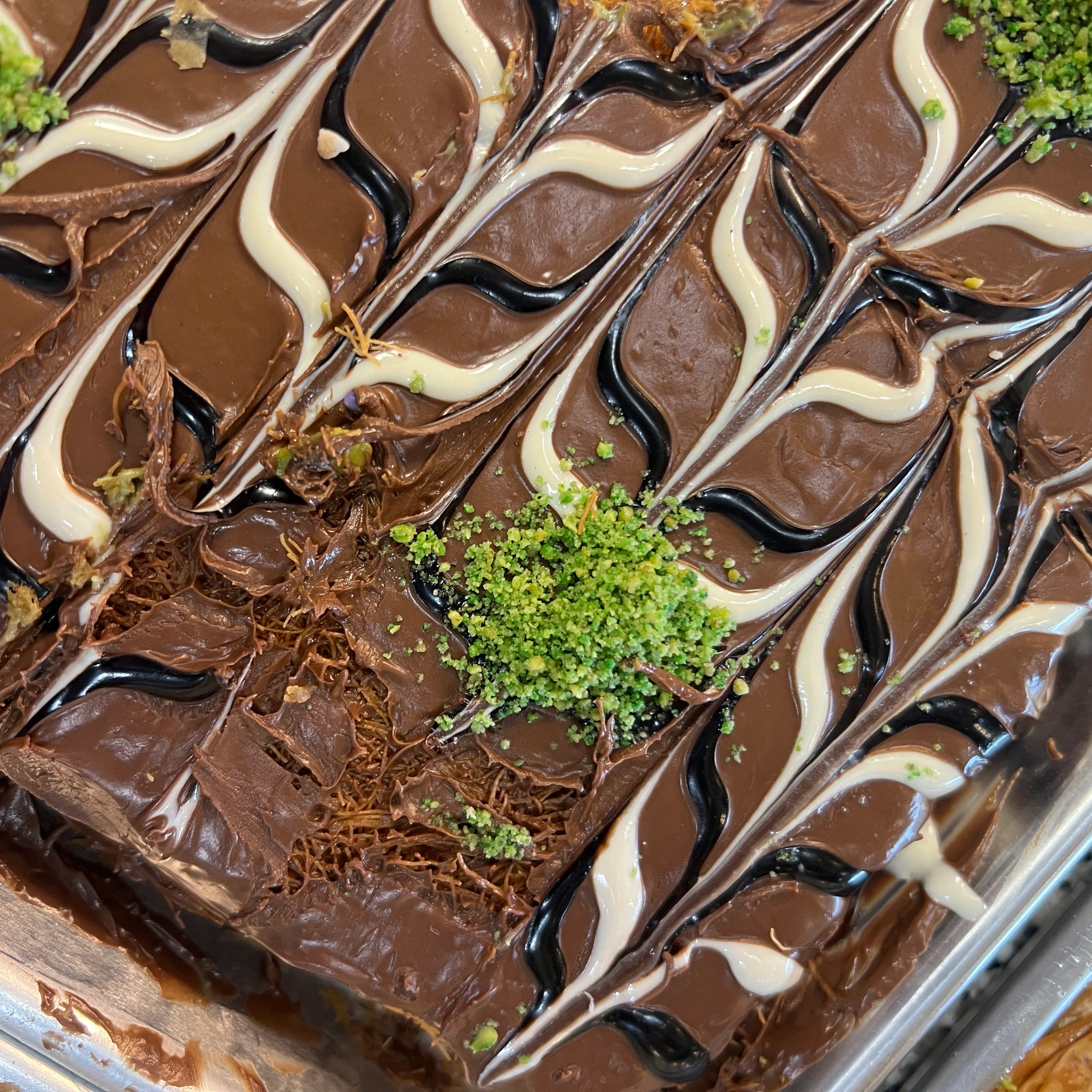 Decadent chocolate baklava with pistachio topping