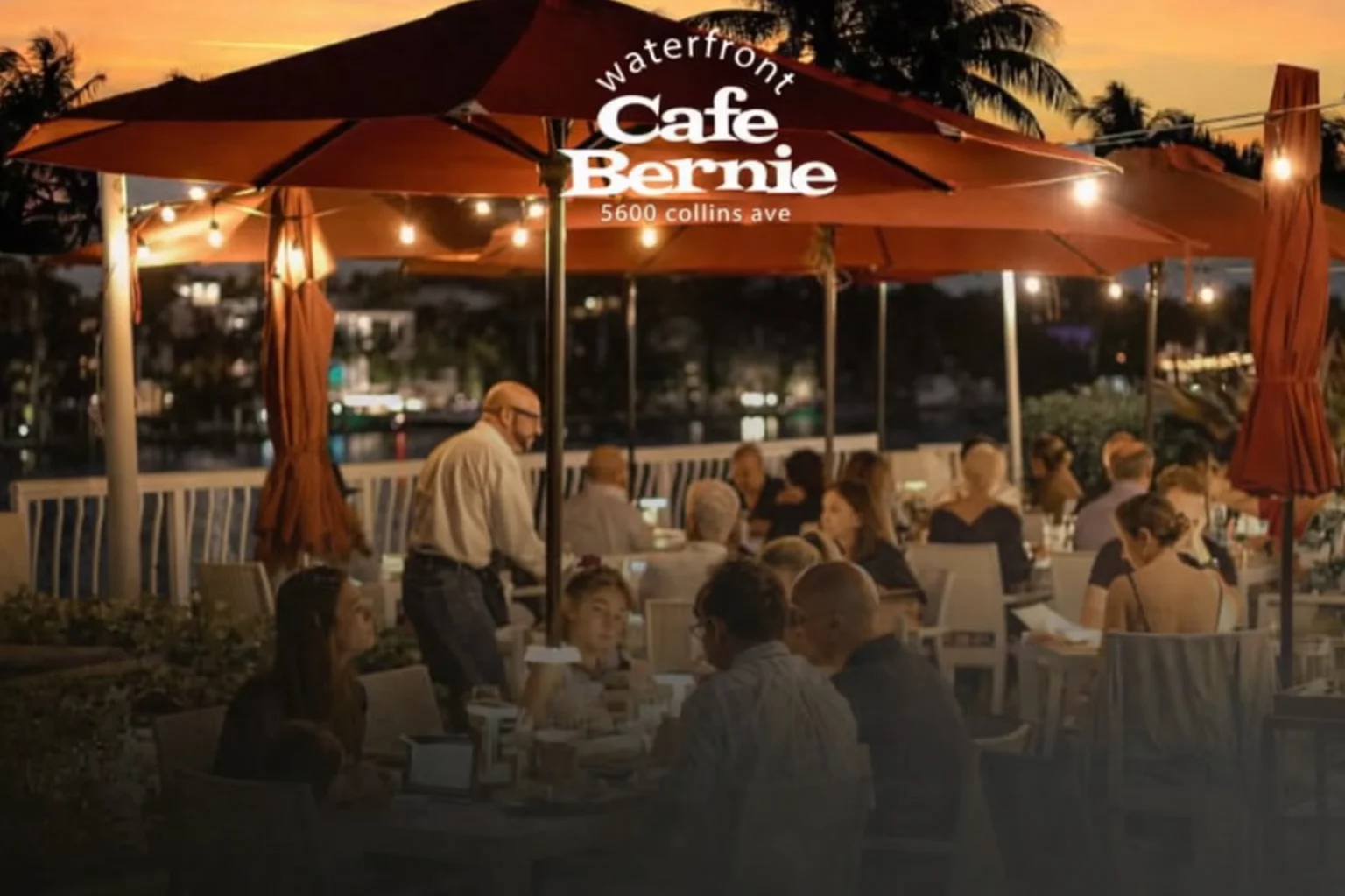Outdoor dining at Cafe Bernie with sunset view