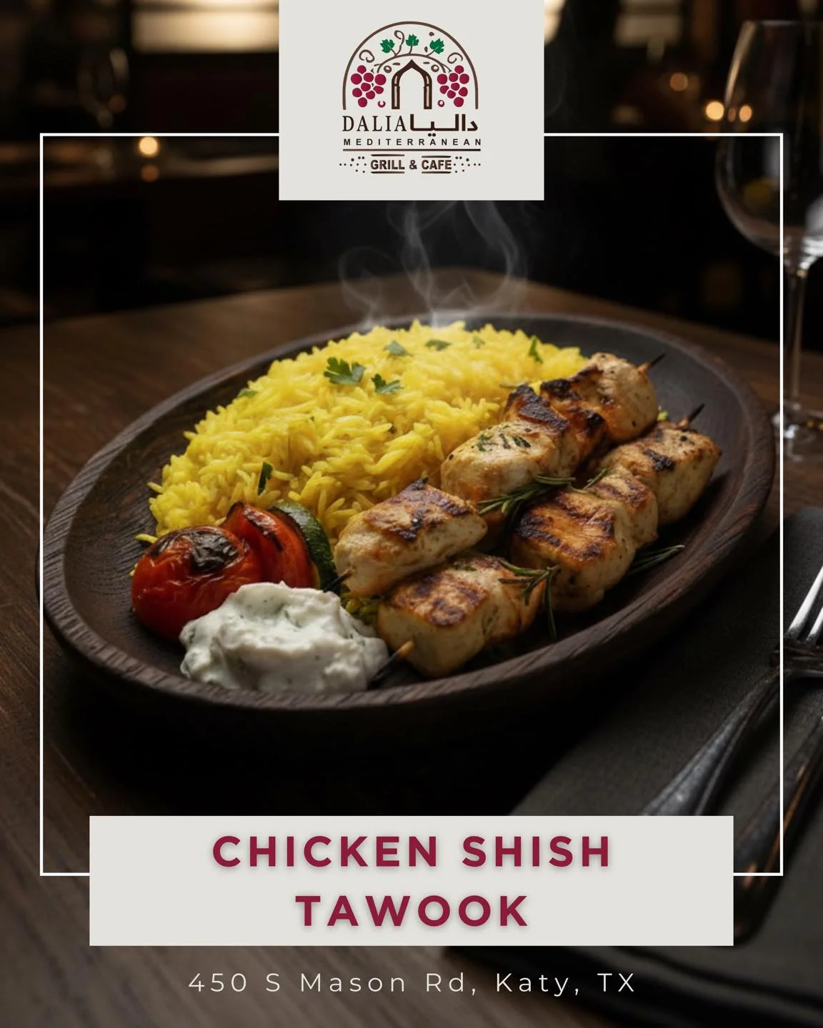A platter of Chicken Shish Tawook served with yellow rice, grilled vegetables, and a side of yogurt sauce.