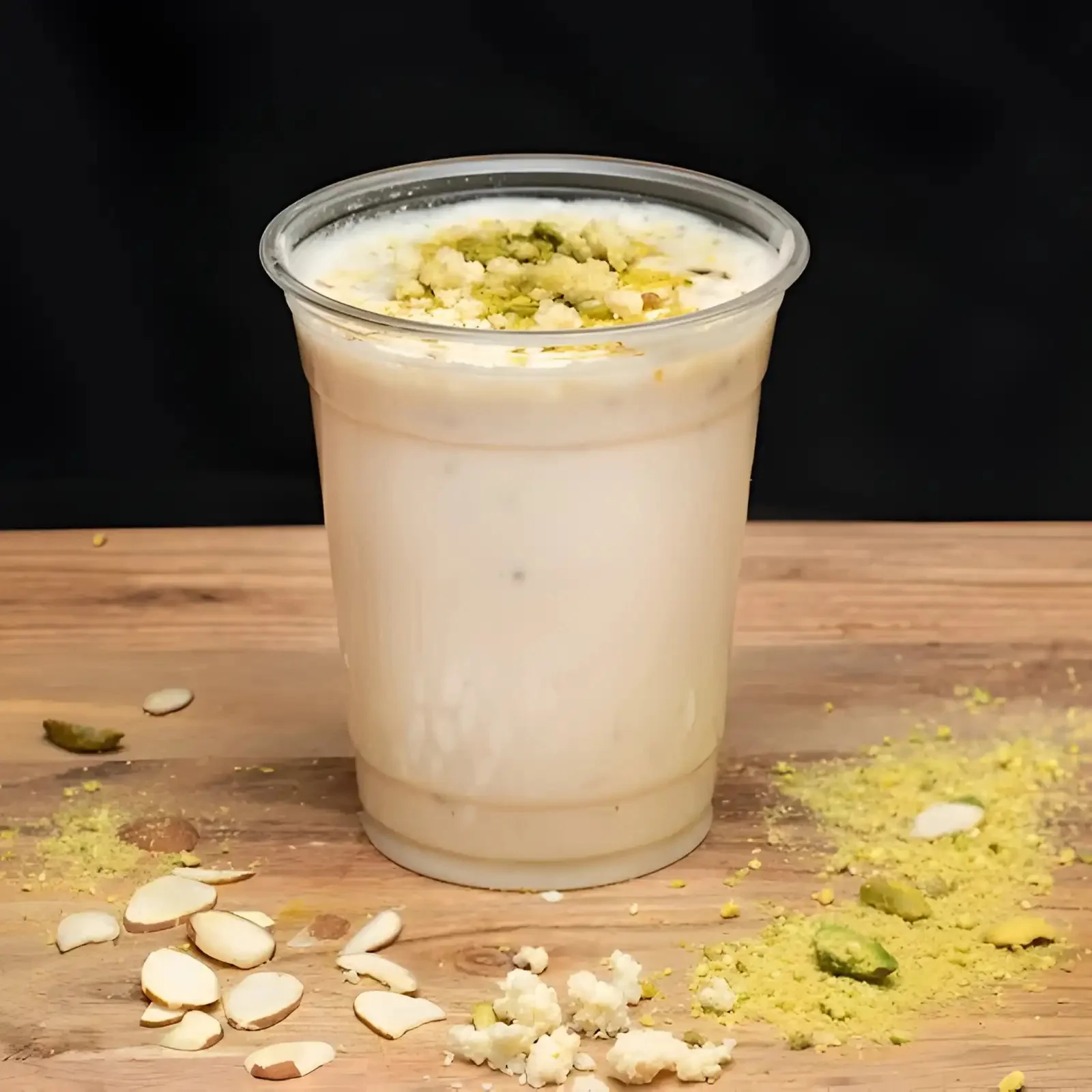 Refreshing Indian lassi topped with nuts and spices
