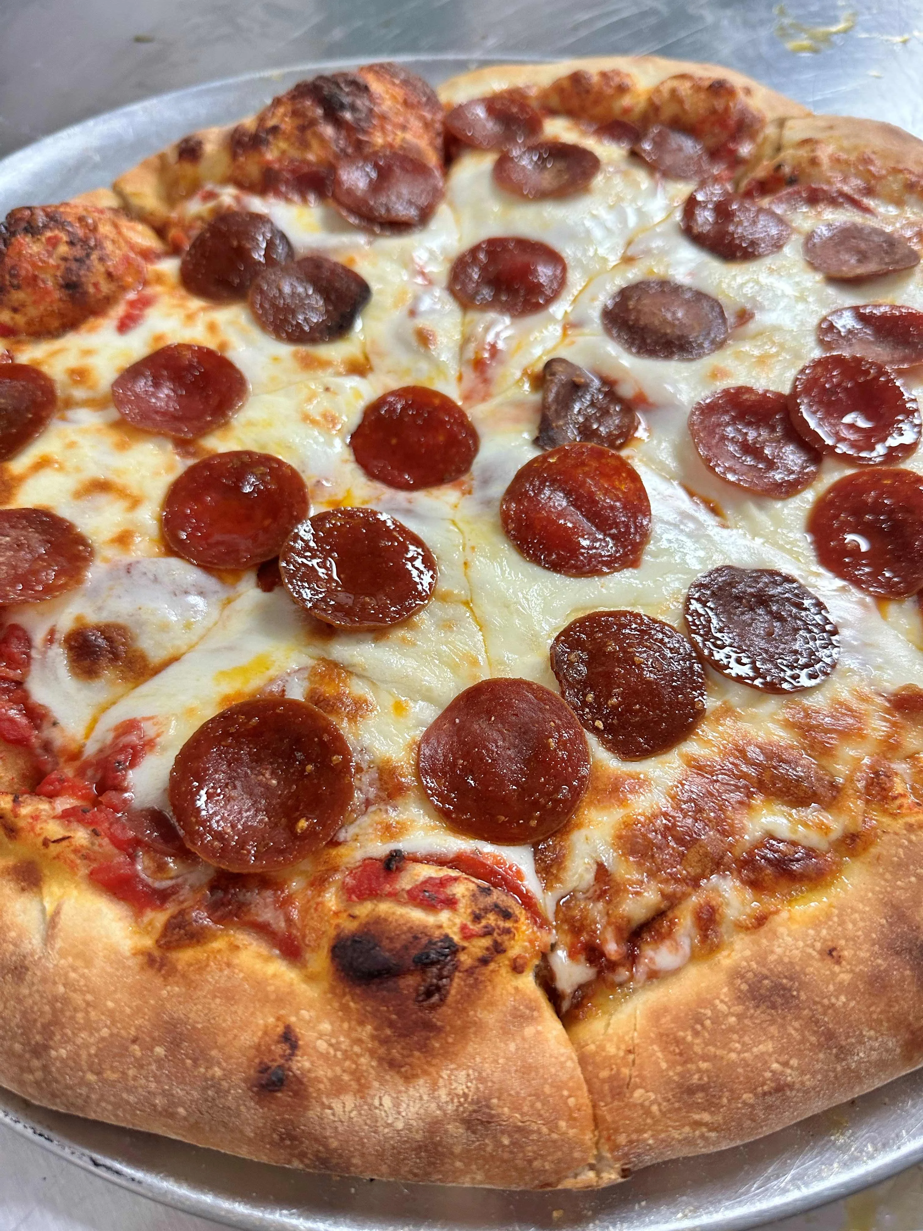 Classic pepperoni pizza with a crispy crust