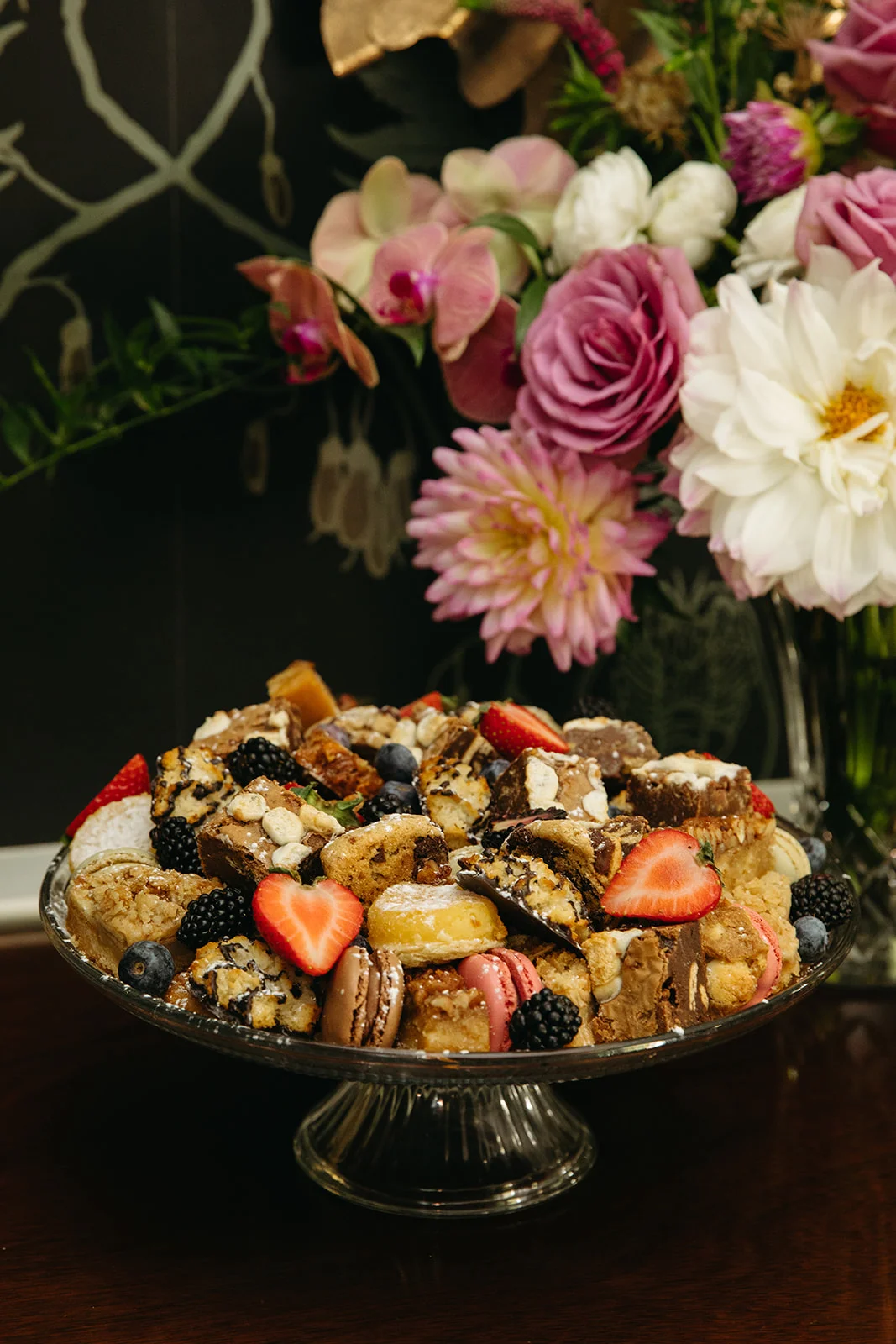 A beautifully arranged plate of food with vibrant colors and garnishes.