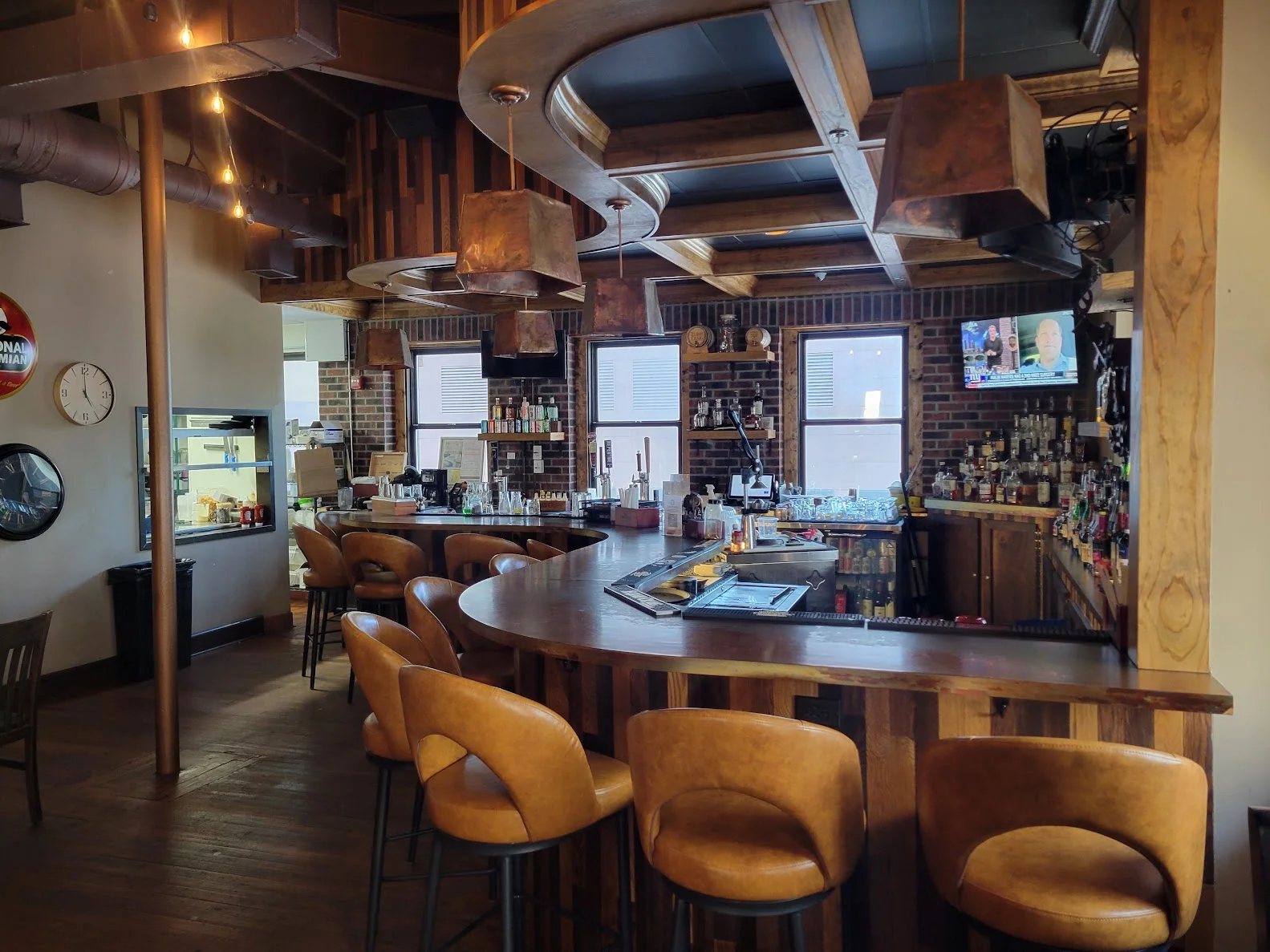 Cozy restaurant interior with a modern bar and warm lighting