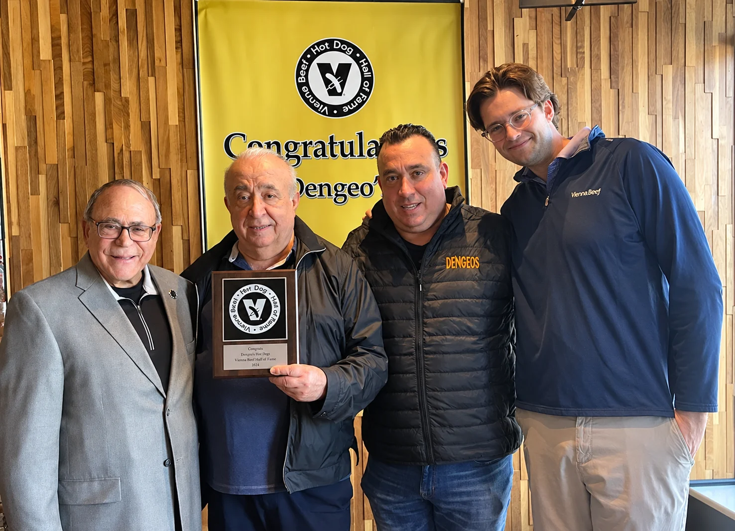 Four Men with a Vienna Beef Award