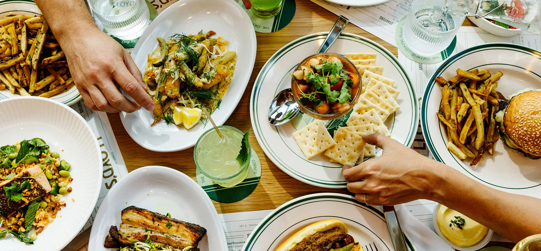 Assorted Mediterranean dishes on a wooden table