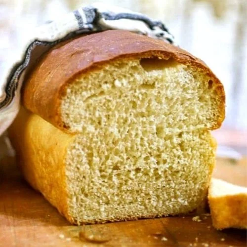 Freshly baked loaf of classic white bread