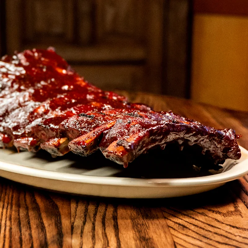 Assorted barbecue platter featuring ribs and brisket