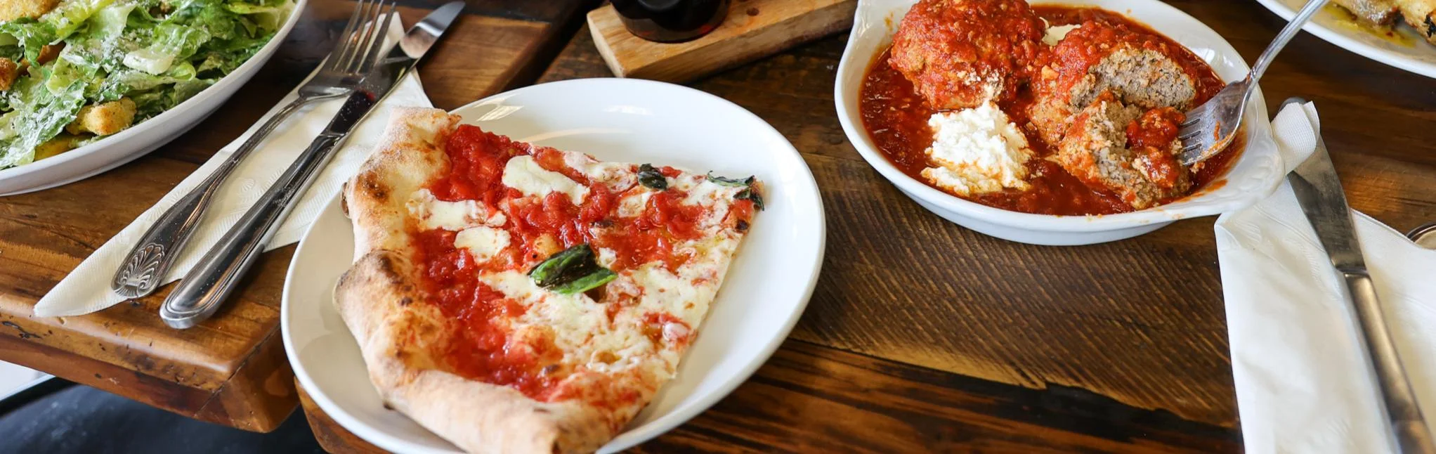 Classic Italian Margherita pizza with meatballs in marinara sauce
