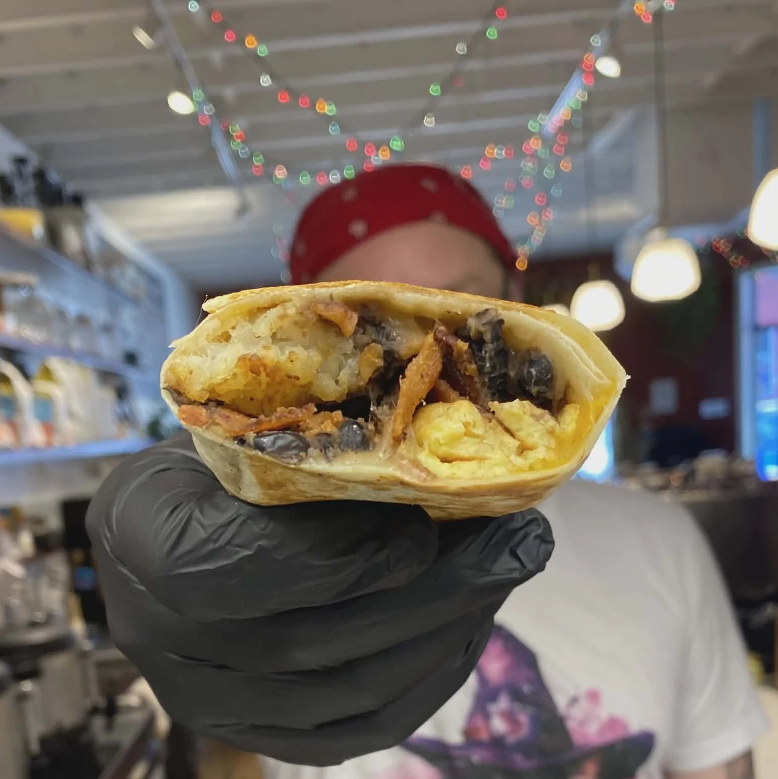 Breakfast burrito filled with eggs and bacon