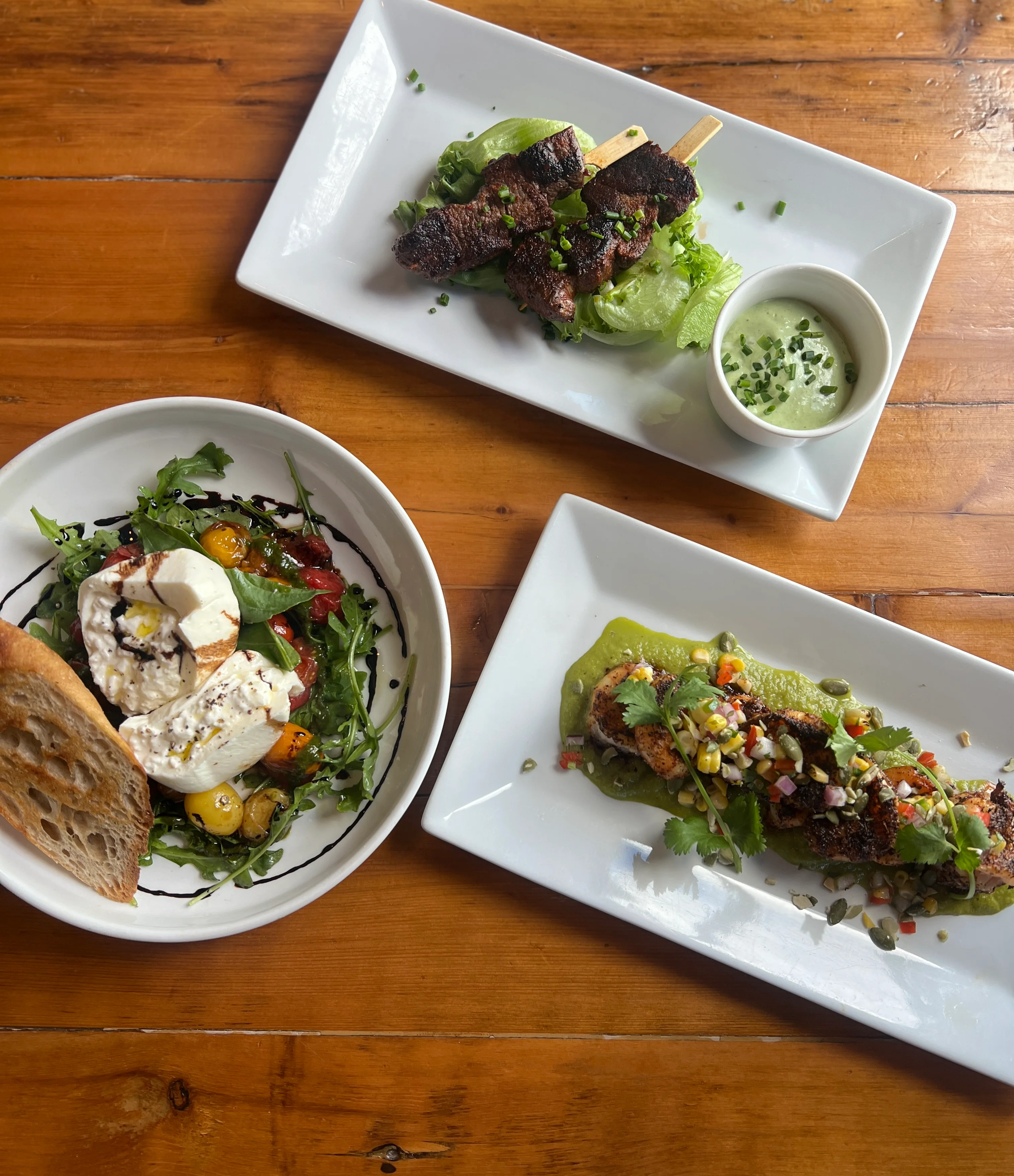 Grilled skewers of carne asada with fresh salsa