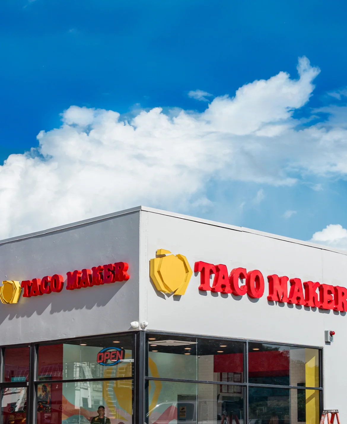 Taco Maker restaurant exterior with bright signage