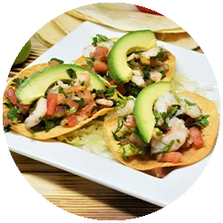 Delicious shrimp ceviche tostadas with avocado and fresh salsa