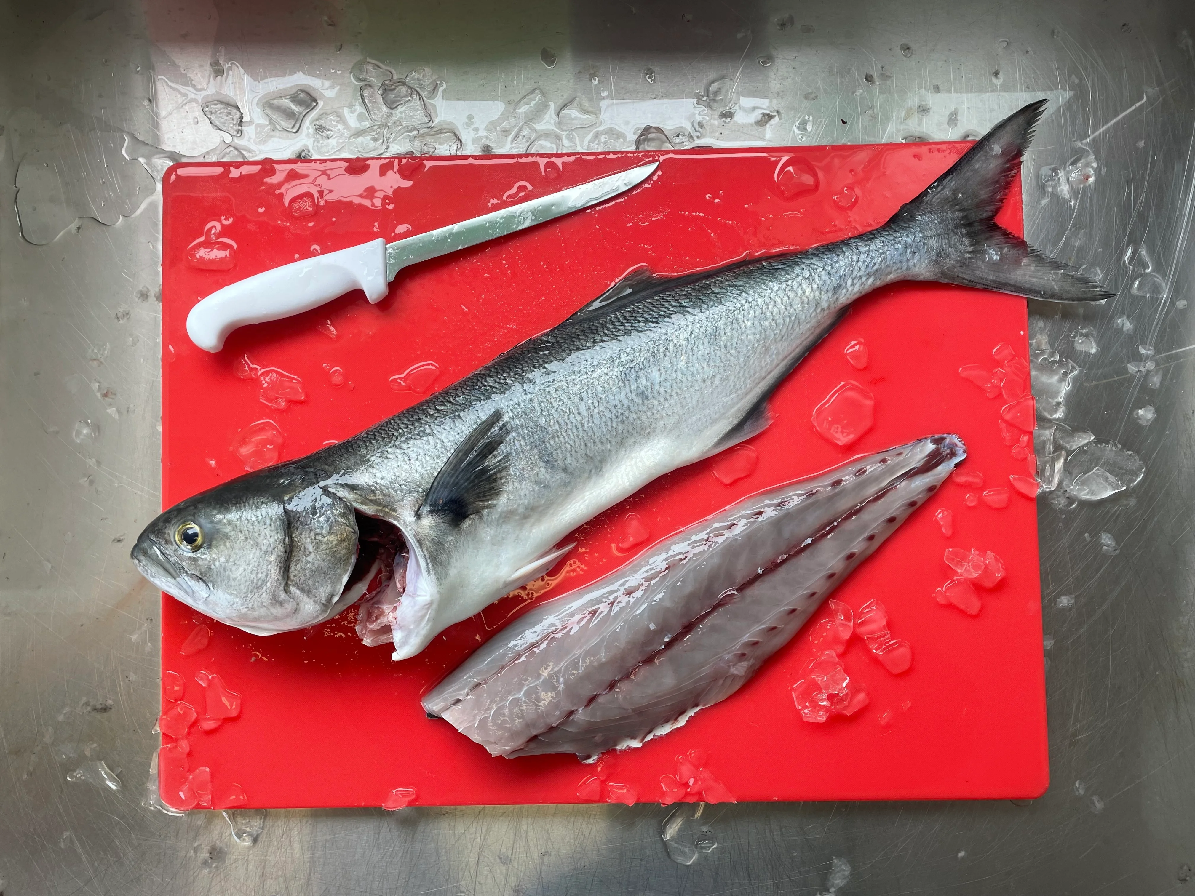 A restaurant chef preparing a dish
