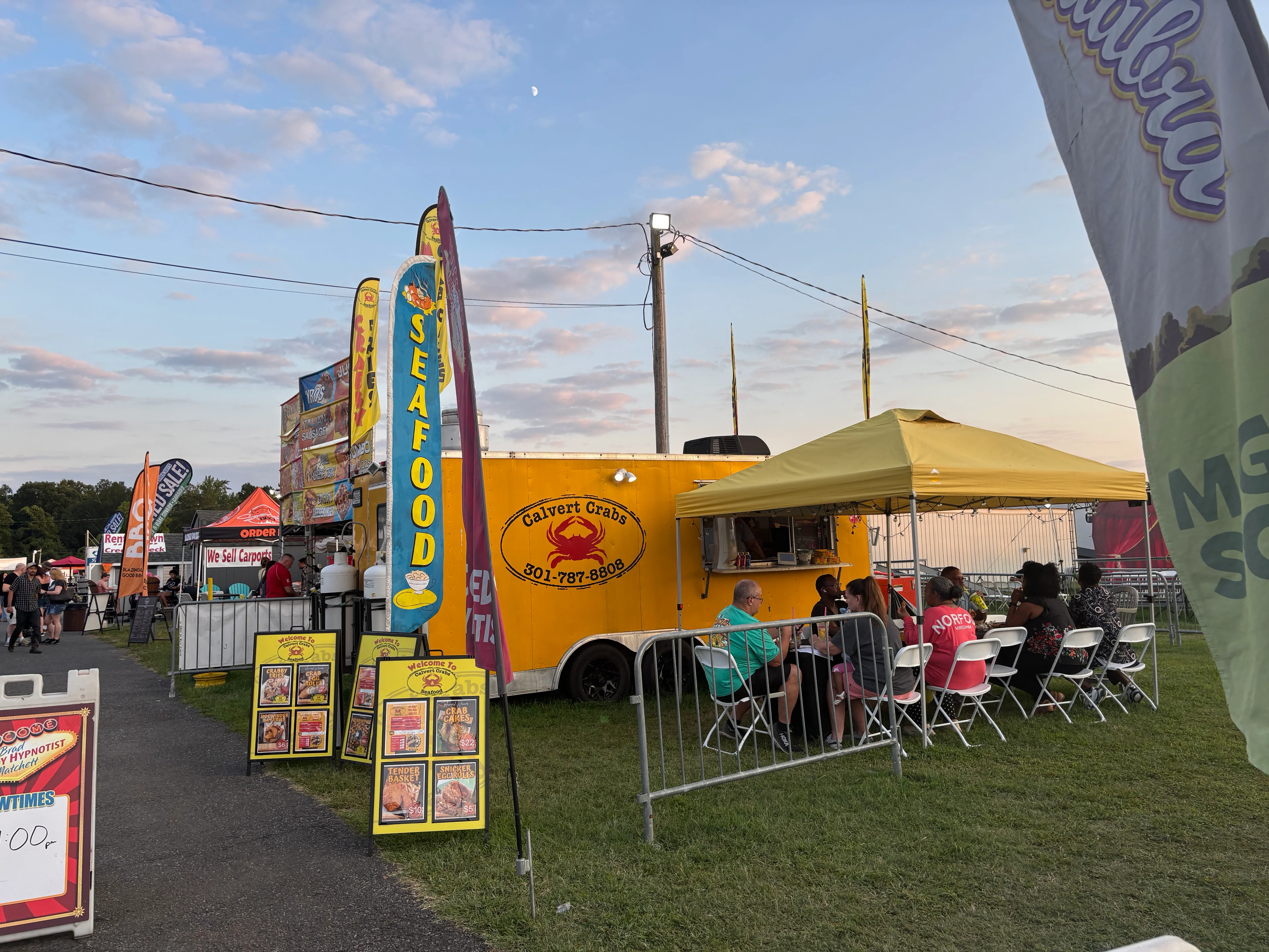 Colorful seafood food truck at a festival