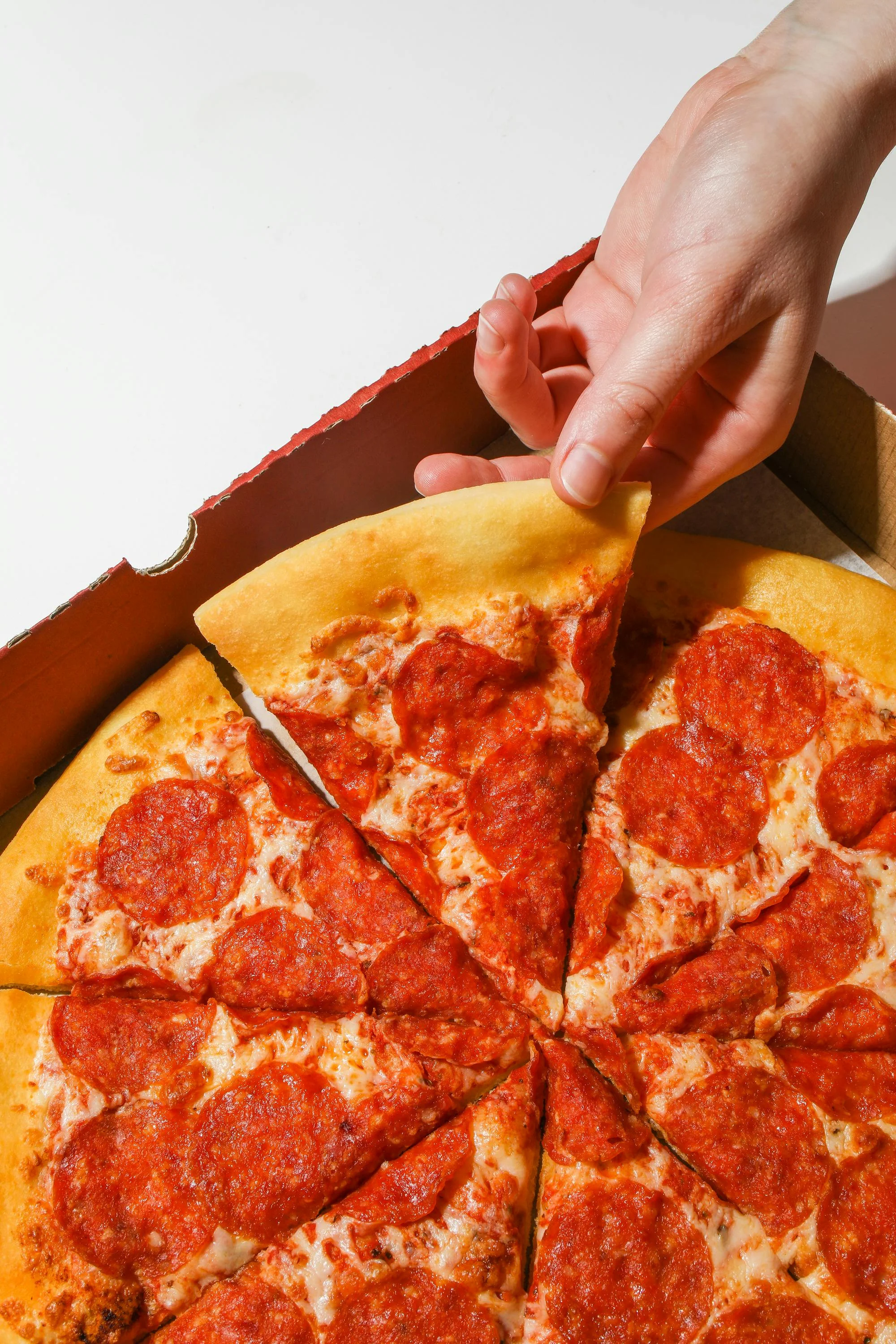 Pepperoni pizza in a delivery box ready to enjoy