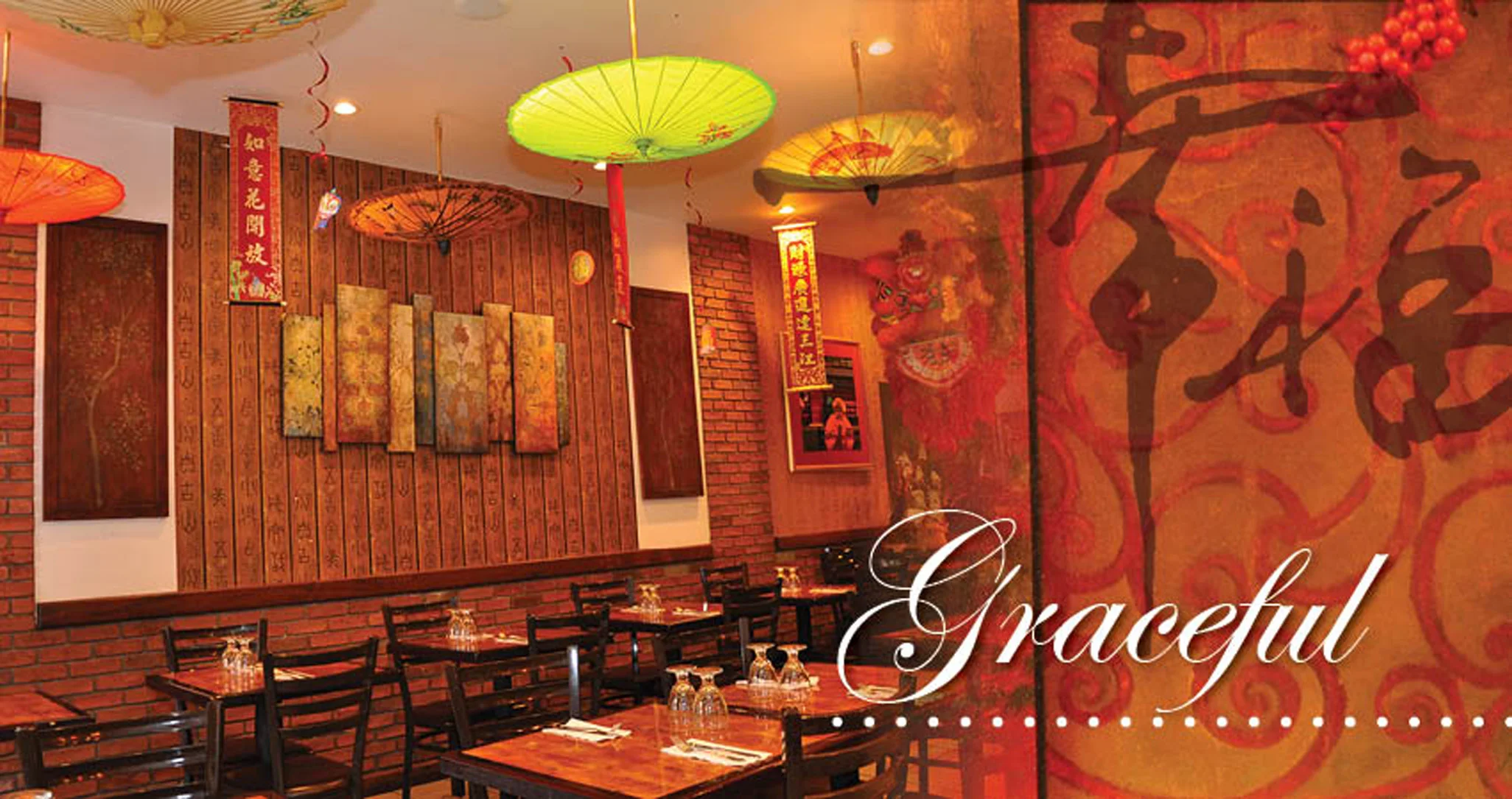 Elegant restaurant interior with Asian decor and colorful umbrellas
