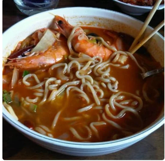 Screenshot of a restaurant menu showcasing various dishes and prices.