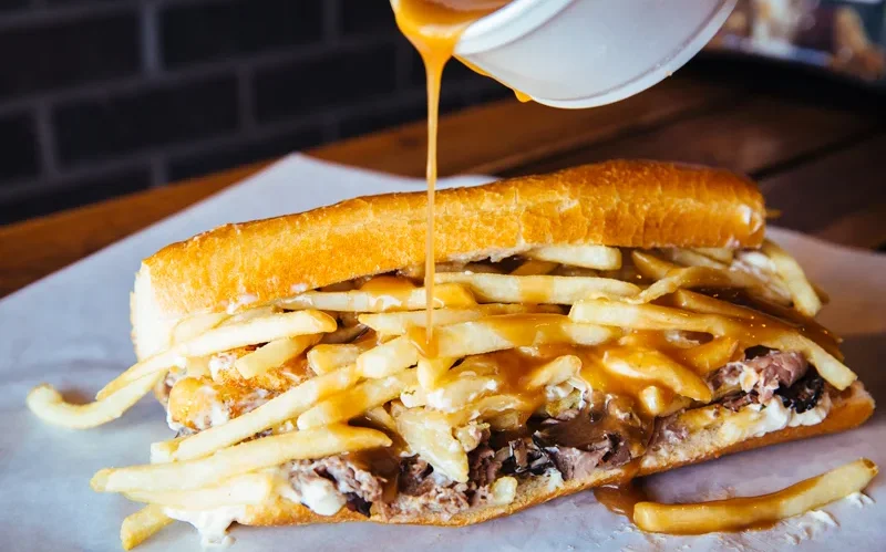 Loaded Canadian poutine sandwich with fries and gravy