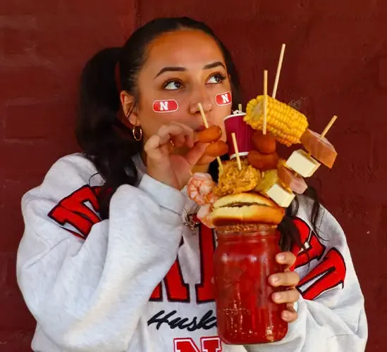 Giant Bloody Mary with assorted snacks and garnishes