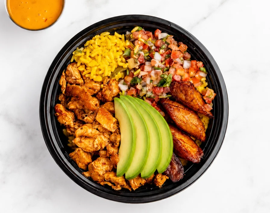 Mexican chicken bowl with rice and avocado
