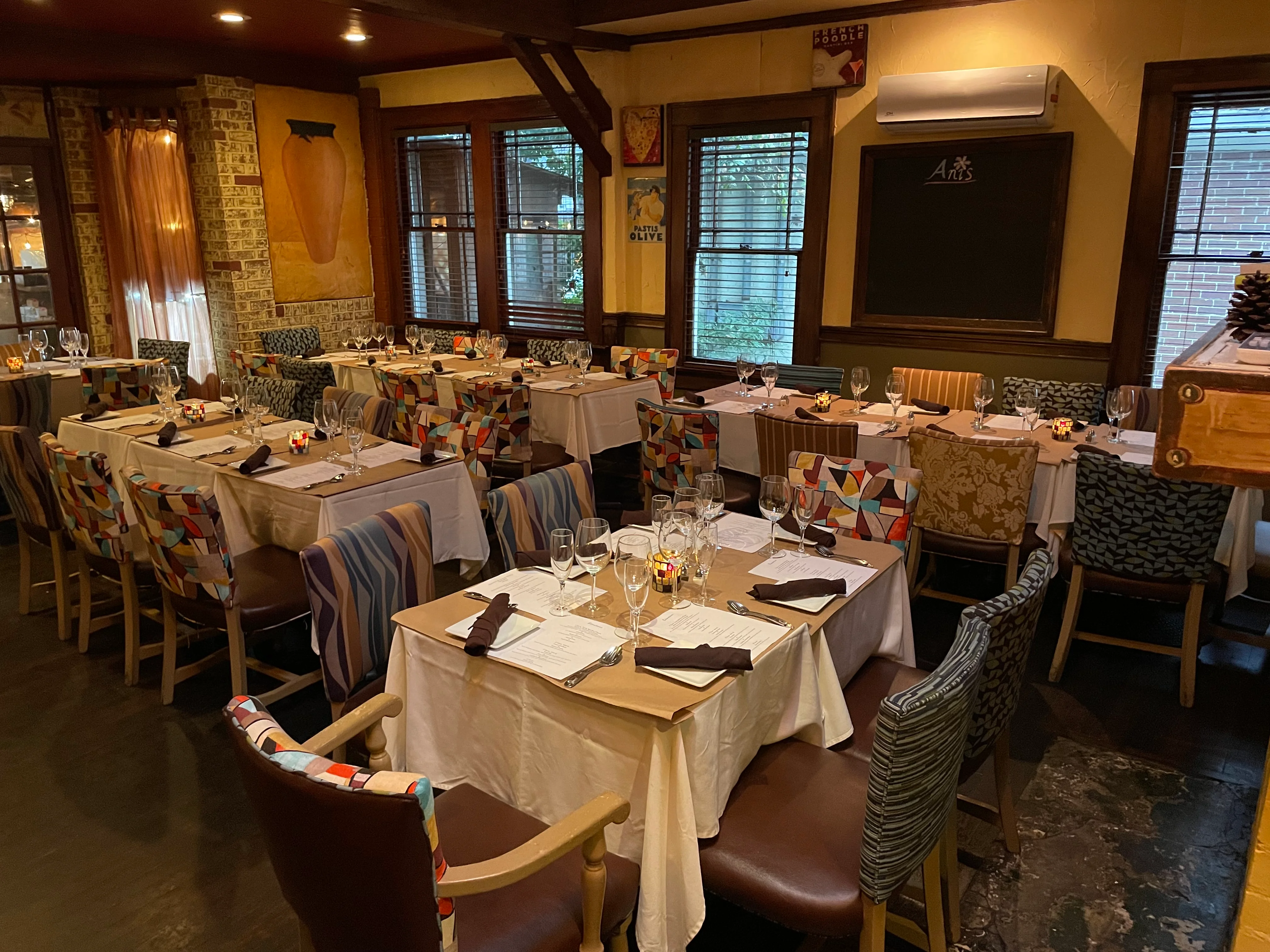 Cozy restaurant interior with colorful seating and warm ambiance