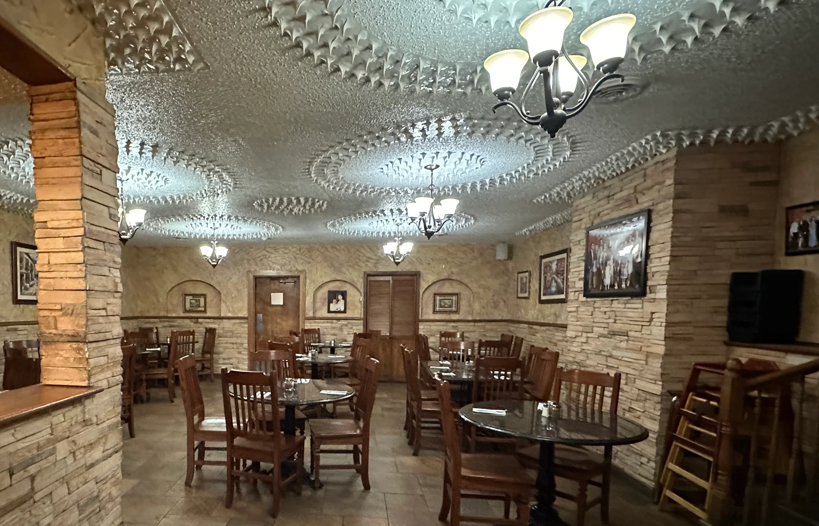 Cozy restaurant interior with rustic decor and warm lighting