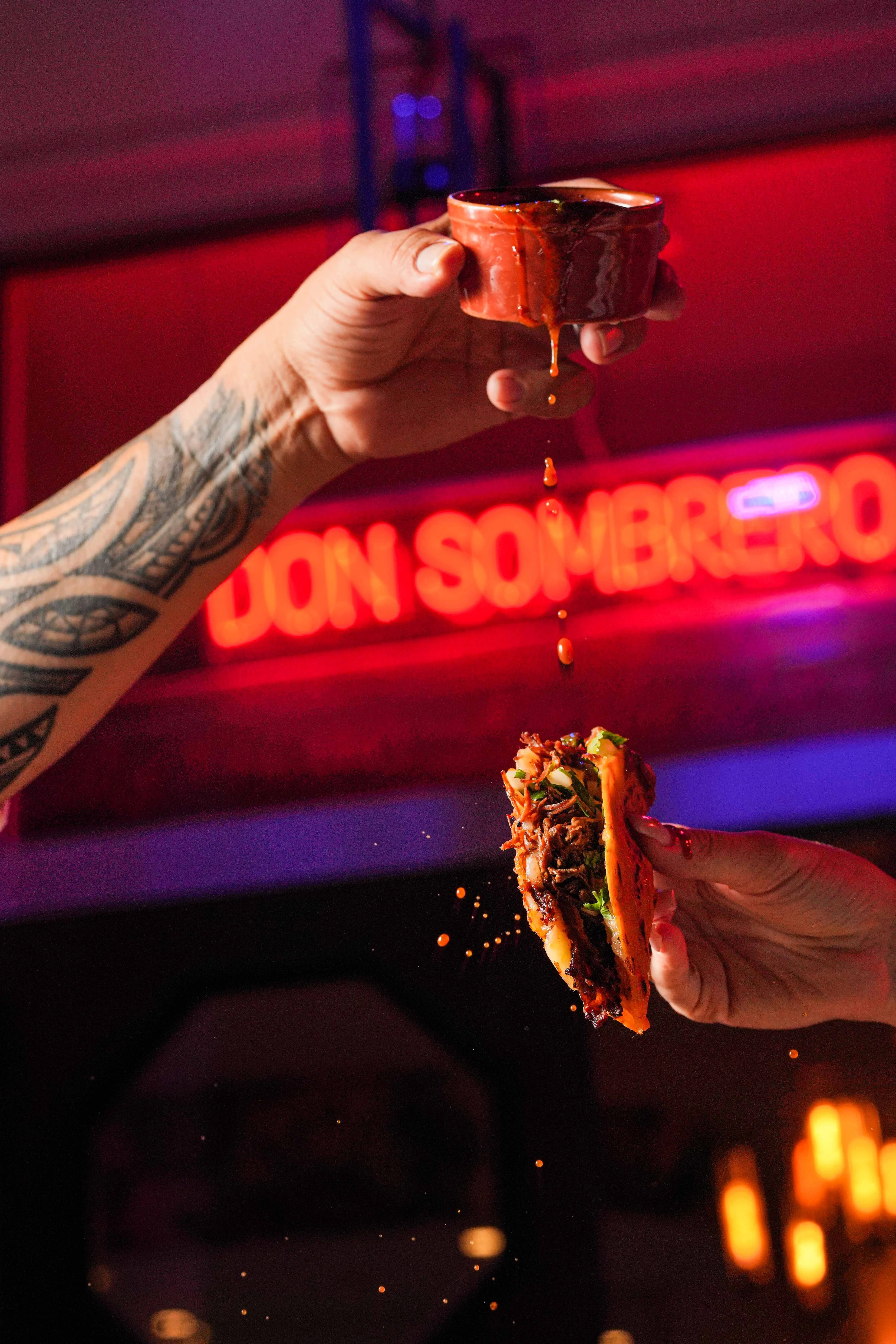 Delicious street taco with spicy sauce and fresh toppings
