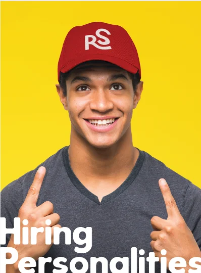 Smiling young man in a red cap promoting hiring personalities