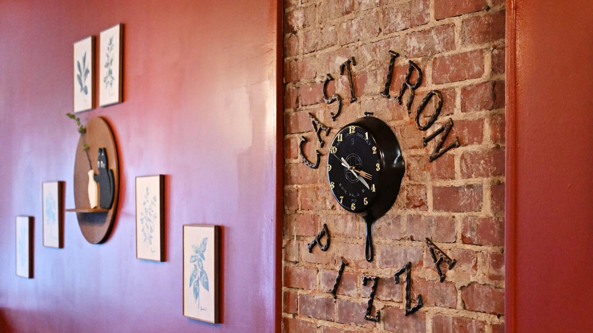Cozy restaurant interior with exposed brick and unique clock decor
