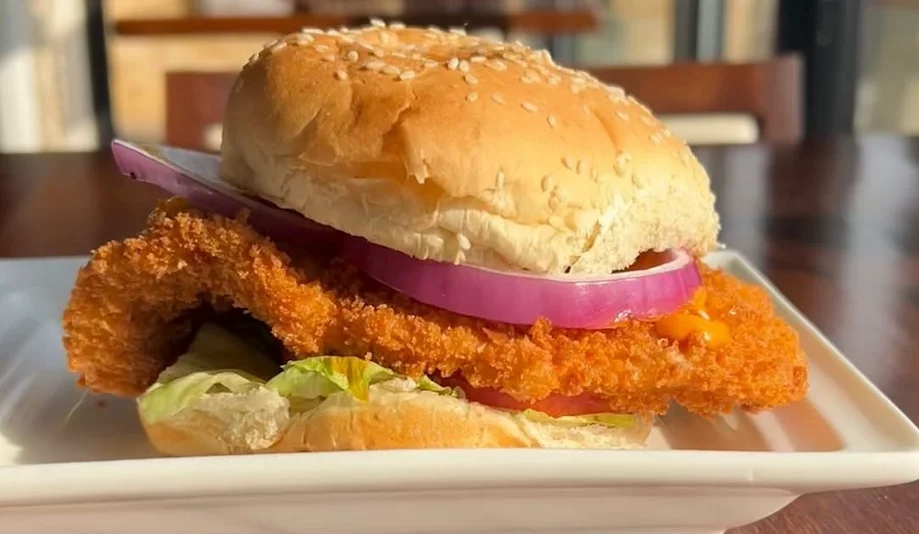 Crispy fried chicken sandwich with sesame bun