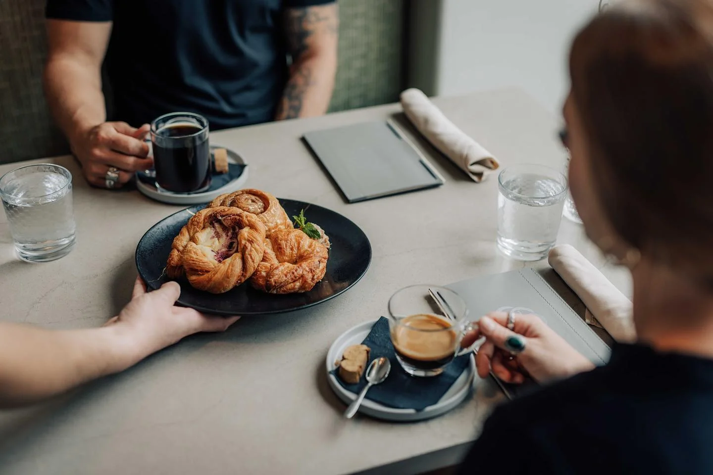 Freshly baked Danish pastries served with coffee